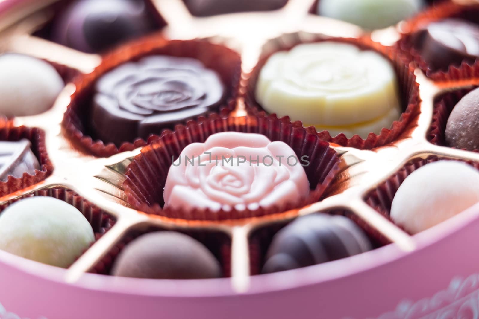Pink Box of Chocolate with Assorted Chocolates, macro by imagesbykenny