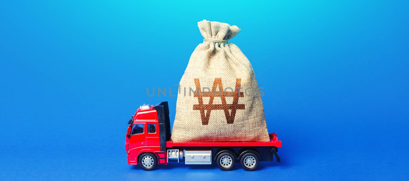Truck is carrying a huge south korean won money bag. Anti-crisis measures of government. Great investment. Attracting large funds to economy for subsidies, support and cheap soft loans for businesses. by iLixe48