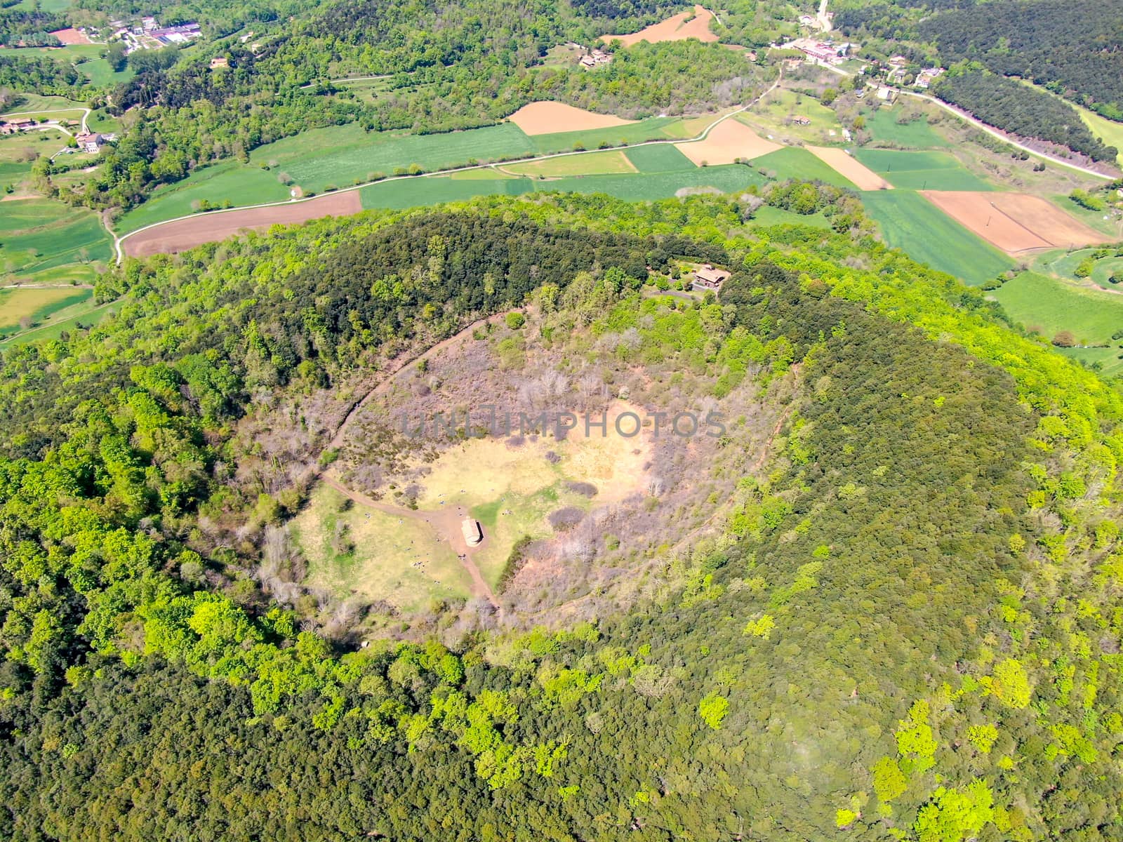 The Santa Margarida Volcano is an extinct volcano in the comarca of Garrotxa, Catalonia, Spain. The volcano has a perimeter of 2 km and a height of 682 meters in Garrotxa Volcanic Zone Natural Park