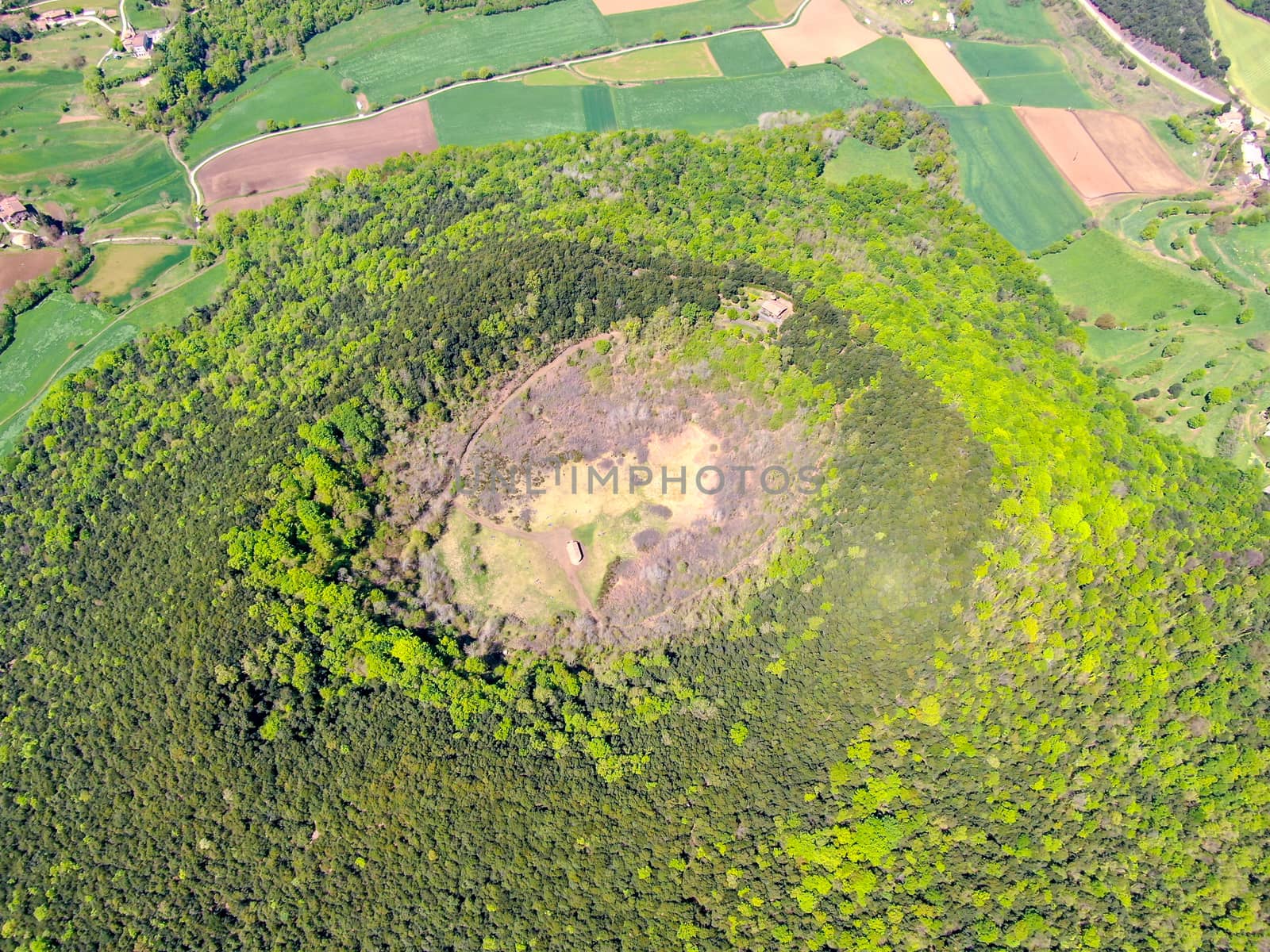 The Santa Margarida Volcano is an extinct volcano in the comarca of Garrotxa, Catalonia, Spain. The volcano has a perimeter of 2 km and a height of 682 meters in Garrotxa Volcanic Zone Natural Park