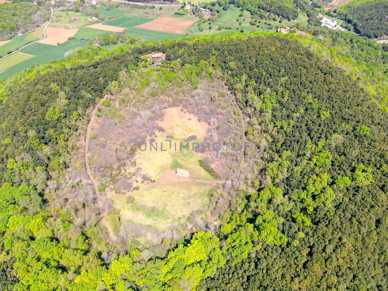 The Santa Margarida Volcano is an extinct volcano in the comarca of Garrotxa, Catalonia, Spain. The volcano has a perimeter of 2 km and a height of 682 meters in Garrotxa Volcanic Zone Natural Park