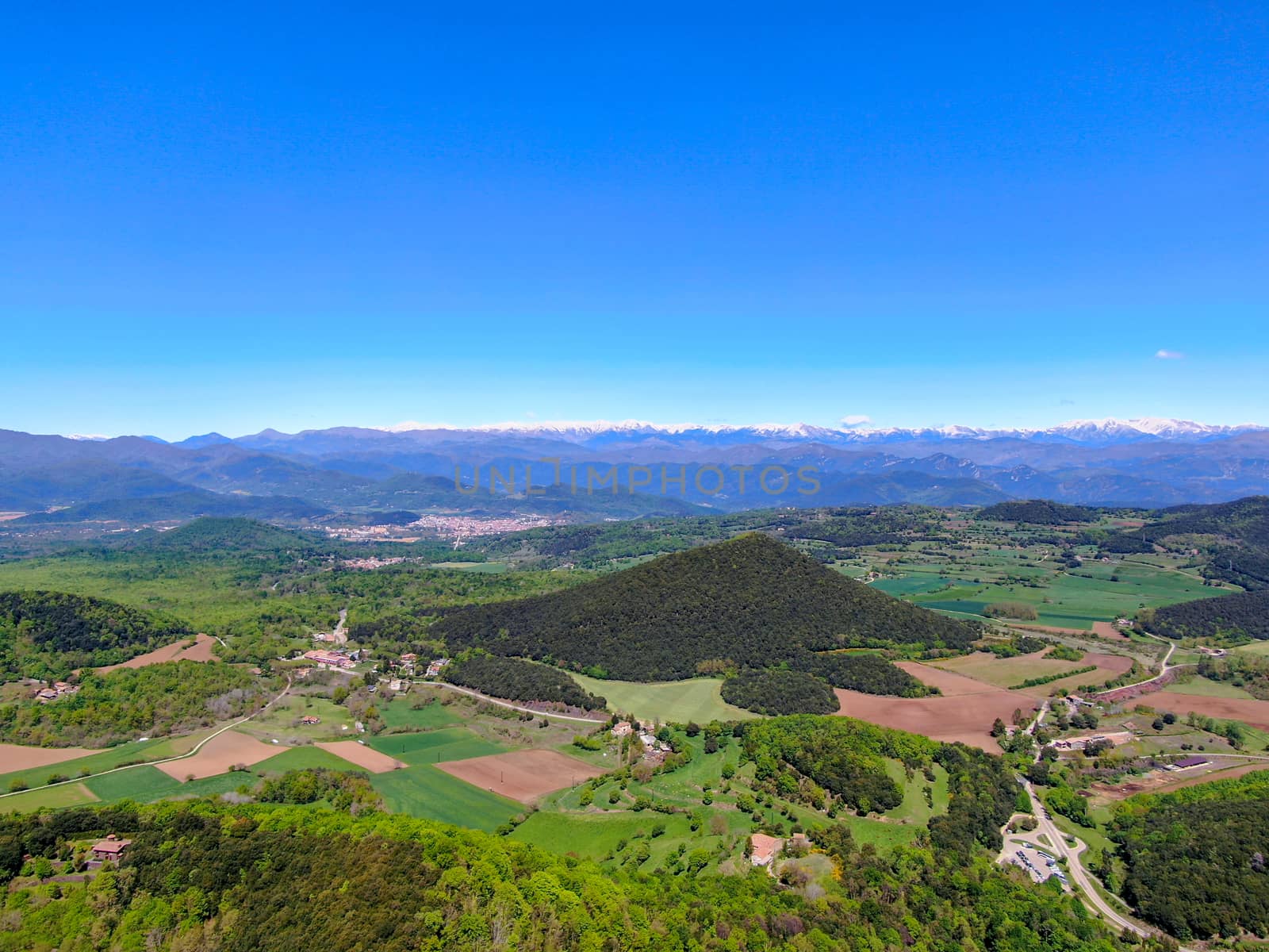 The Santa Margarida Volcano is an extinct volcano in the comarca of Garrotxa, Catalonia, Spain. The volcano has a perimeter of 2 km and a height of 682 meters in Garrotxa Volcanic Zone Natural Park