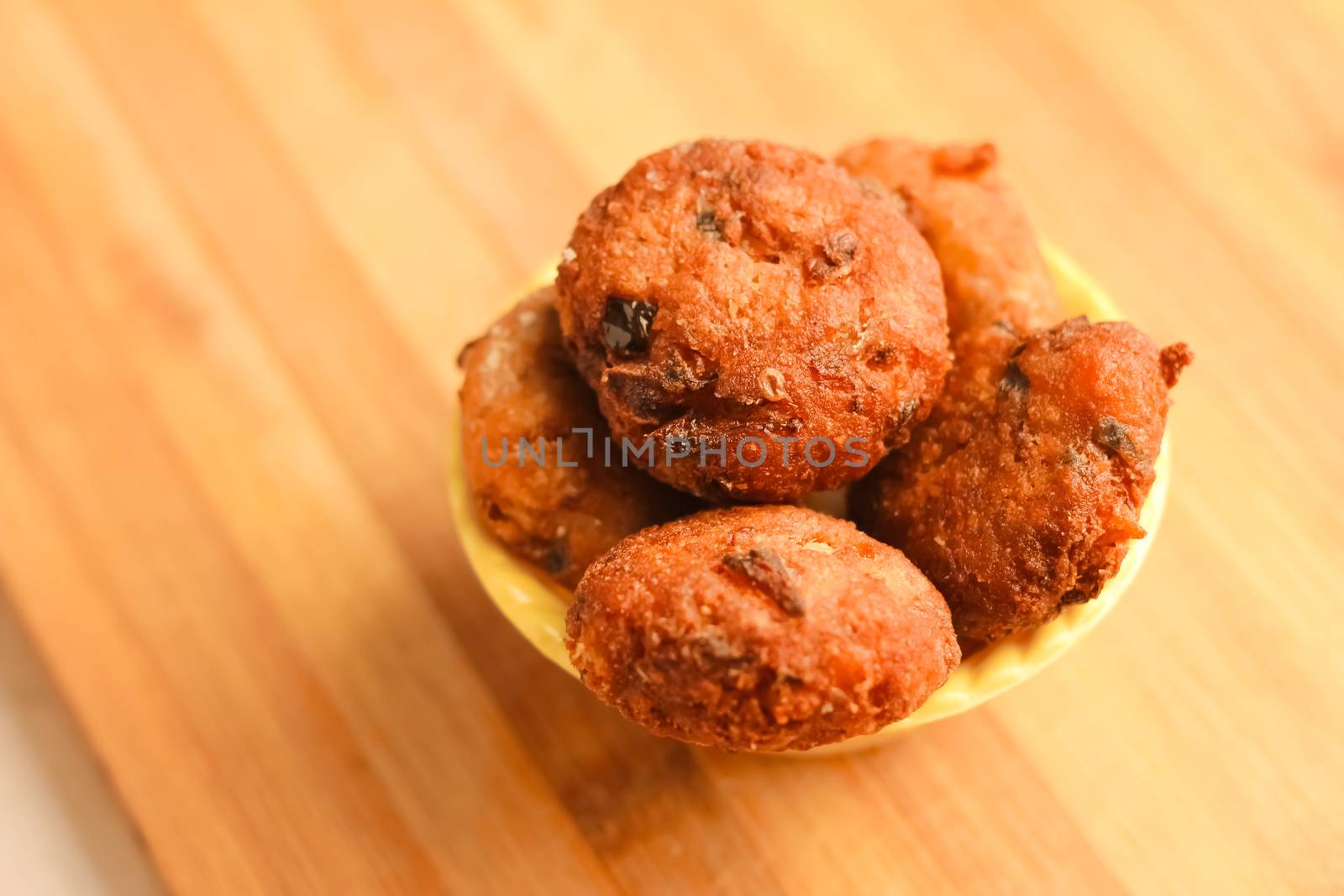 Desi Indian snack tikki/cutlet kept on wooden spoon, selective focus, food concept