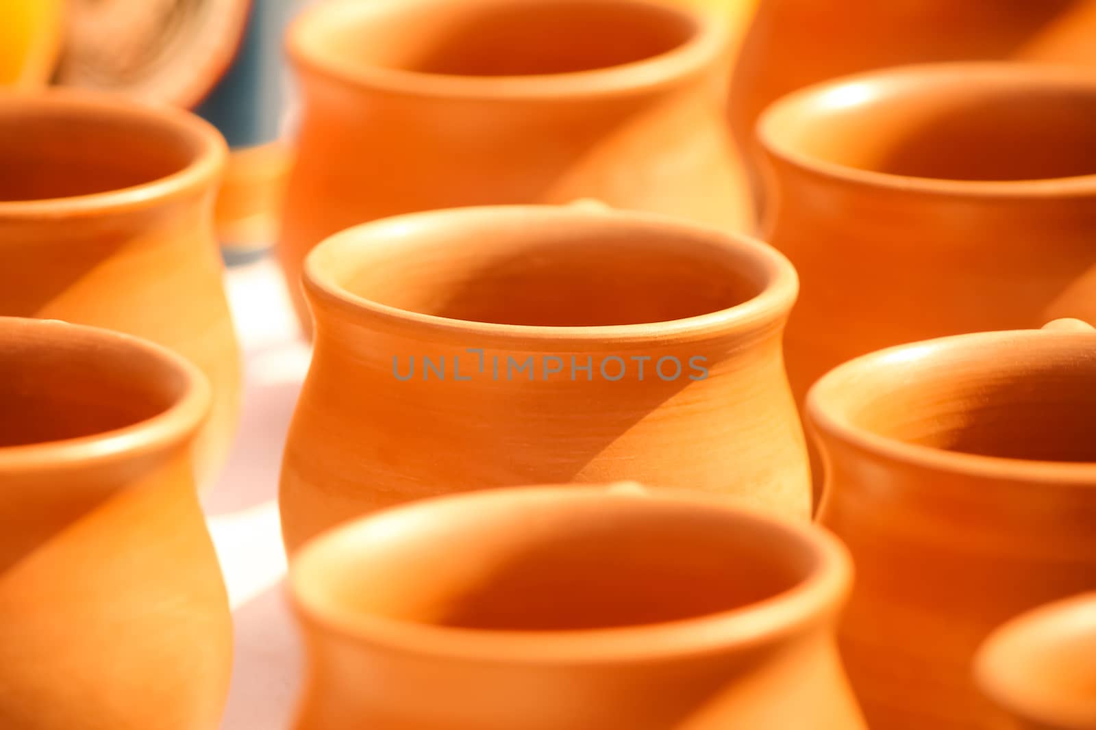 Disposable clay cups in a row