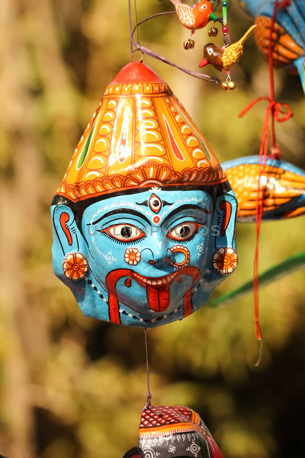 hanging face mask of goddess durga kali avatar made of clay