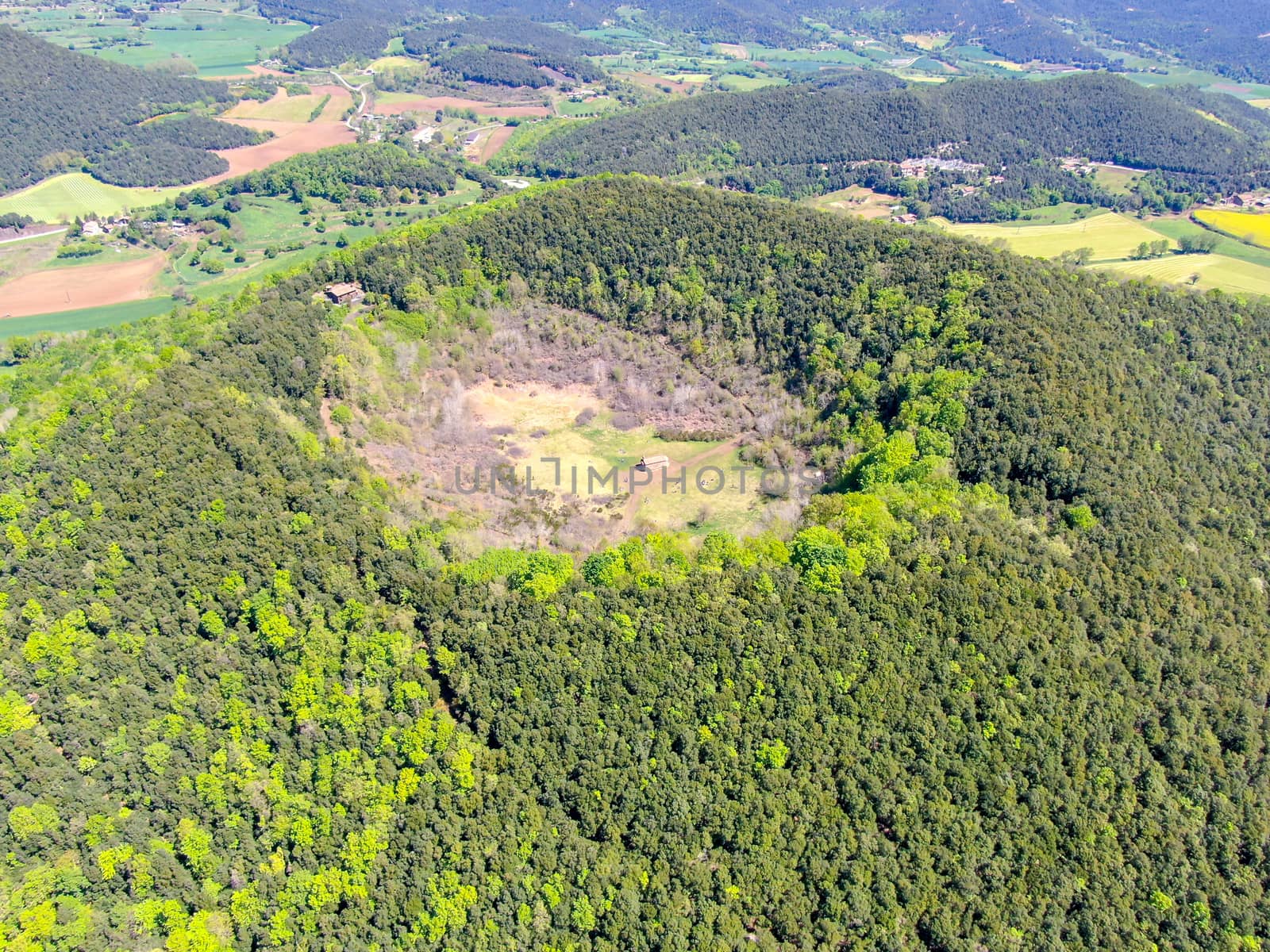 The Santa Margarida Volcano is an extinct volcano in the comarca of Garrotxa, Catalonia, Spain. The volcano has a perimeter of 2 km and a height of 682 meters in Garrotxa Volcanic Zone Natural Park