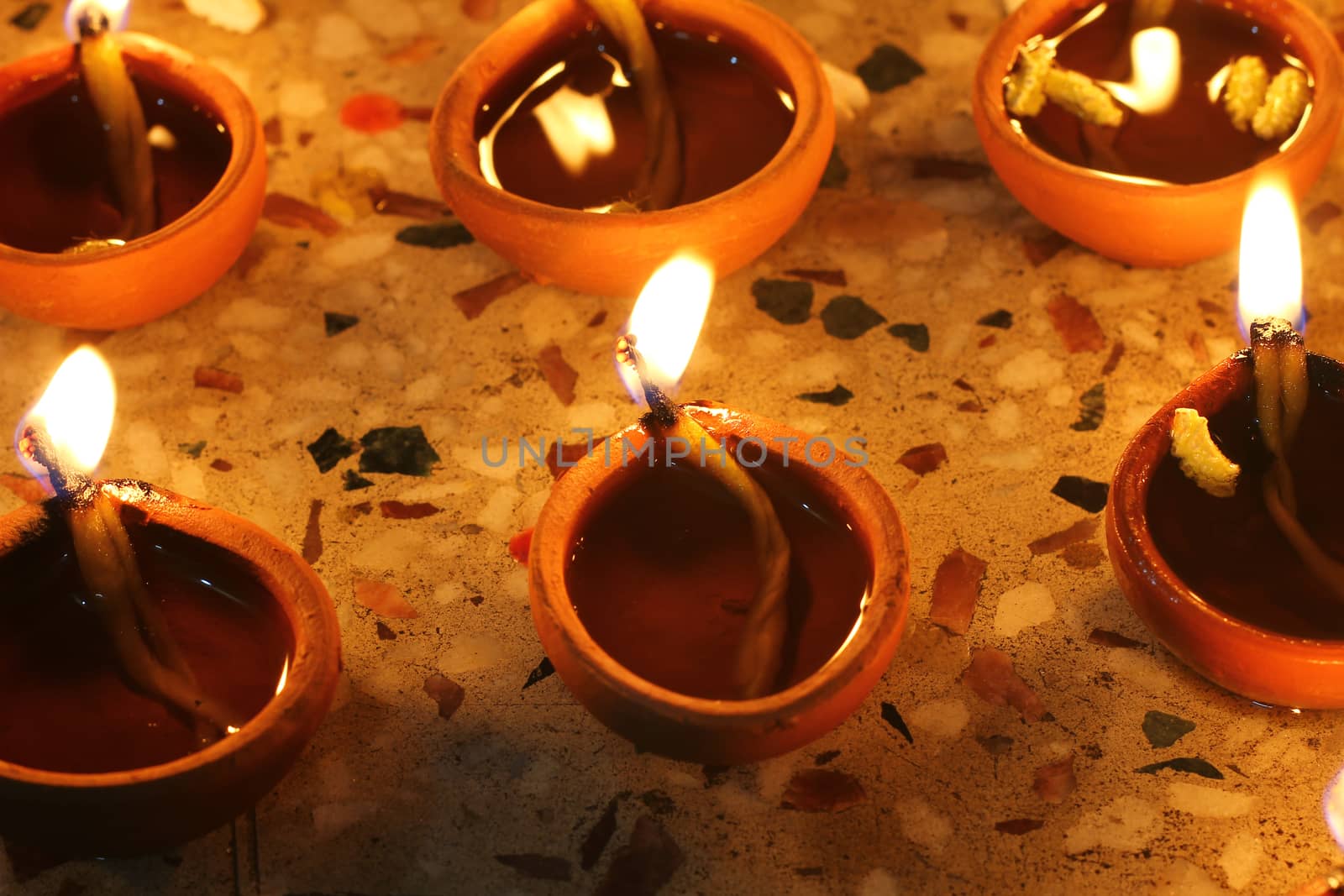 oil lamps lit on diwali festival