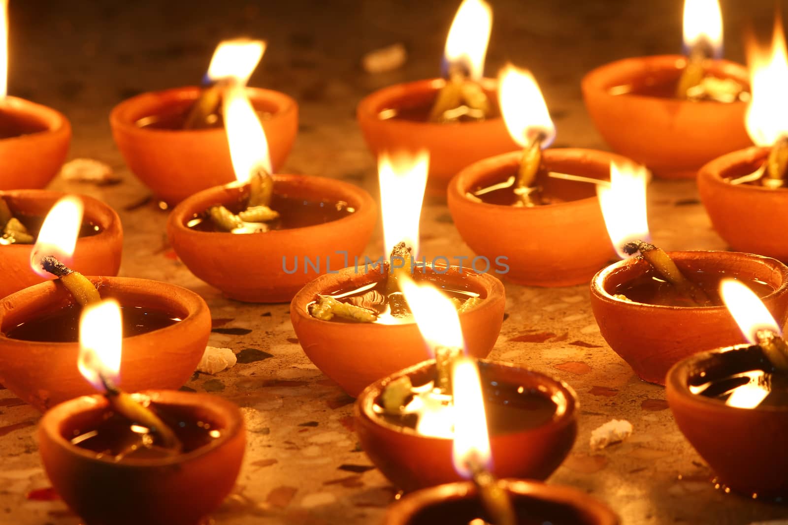 oil lamps lit on diwali festival