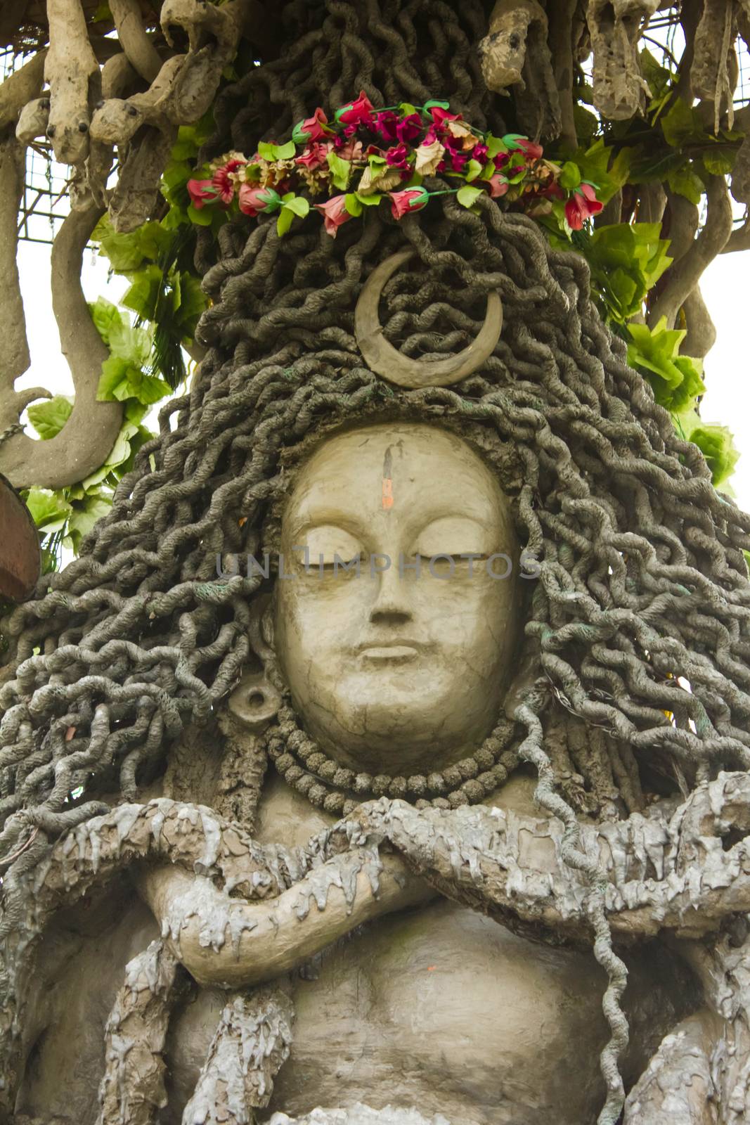 closeup of stoned shiv idol in abandon place in chail, icon of hindu god shiva used to perform puja or prayers