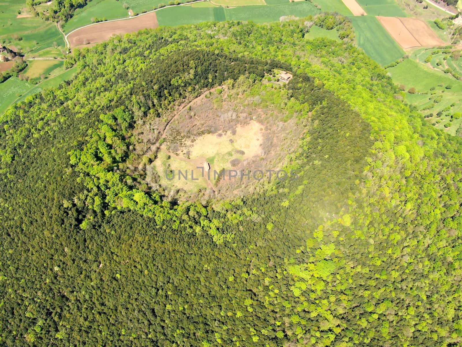 The Santa Margarida Volcano is an extinct volcano in the comarca of Garrotxa, Catalonia, Spain. The volcano has a perimeter of 2 km and a height of 682 meters in Garrotxa Volcanic Zone Natural Park