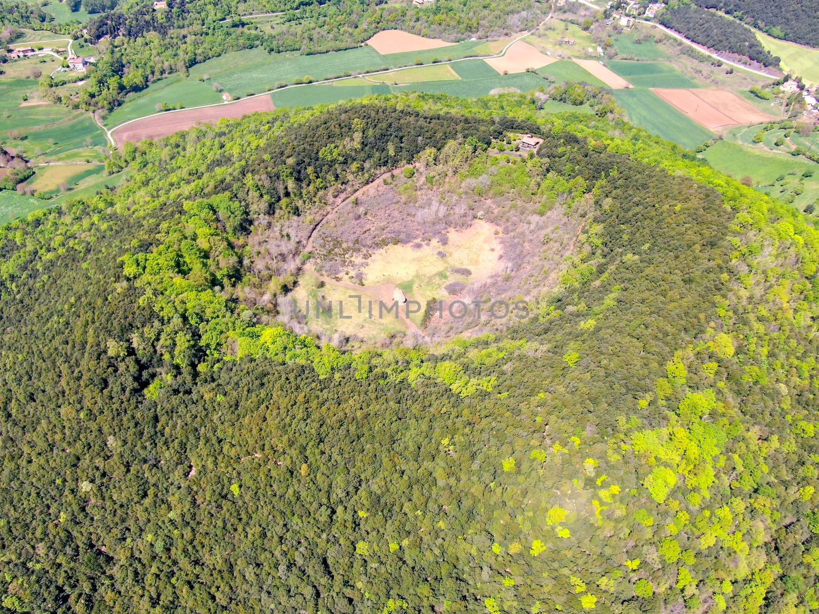 The Santa Margarida Volcano is an extinct volcano in the comarca of Garrotxa, Catalonia, Spain. The volcano has a perimeter of 2 km and a height of 682 meters in Garrotxa Volcanic Zone Natural Park