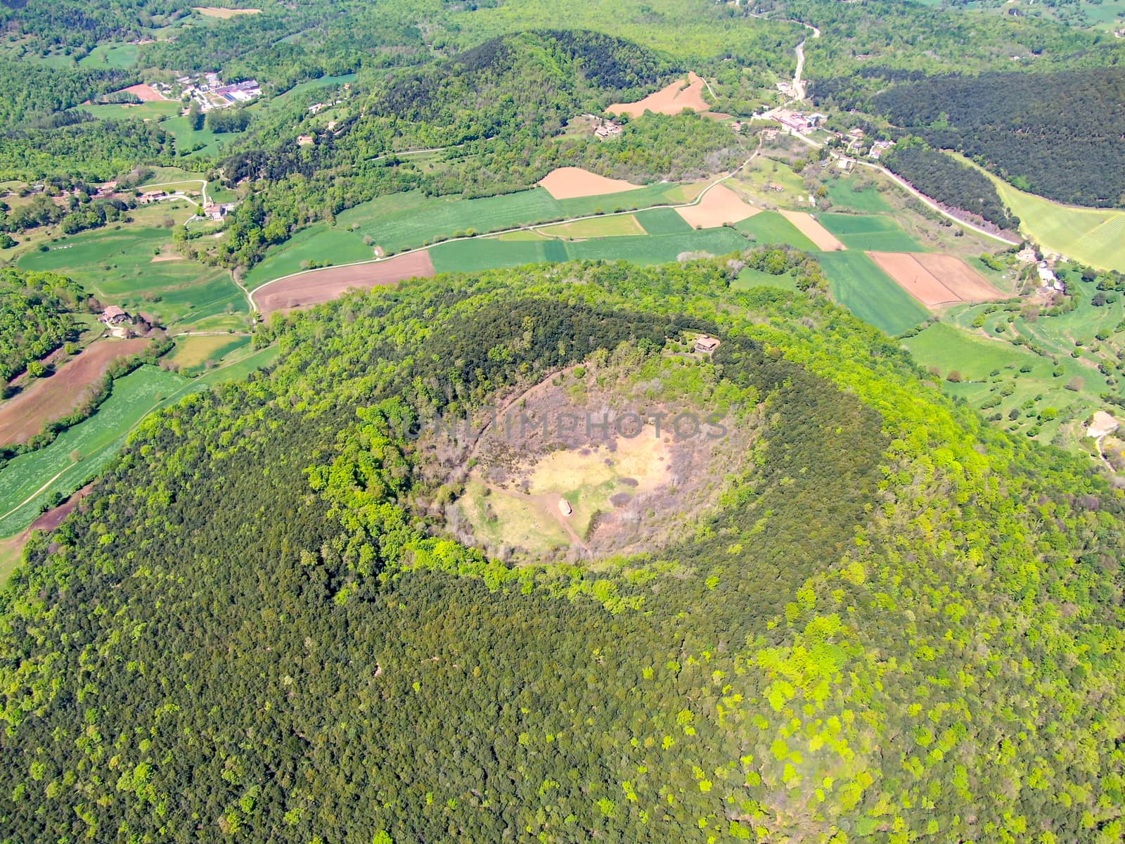 The Santa Margarida Volcano is an extinct volcano in the comarca of Garrotxa, Catalonia, Spain. The volcano has a perimeter of 2 km and a height of 682 meters in Garrotxa Volcanic Zone Natural Park