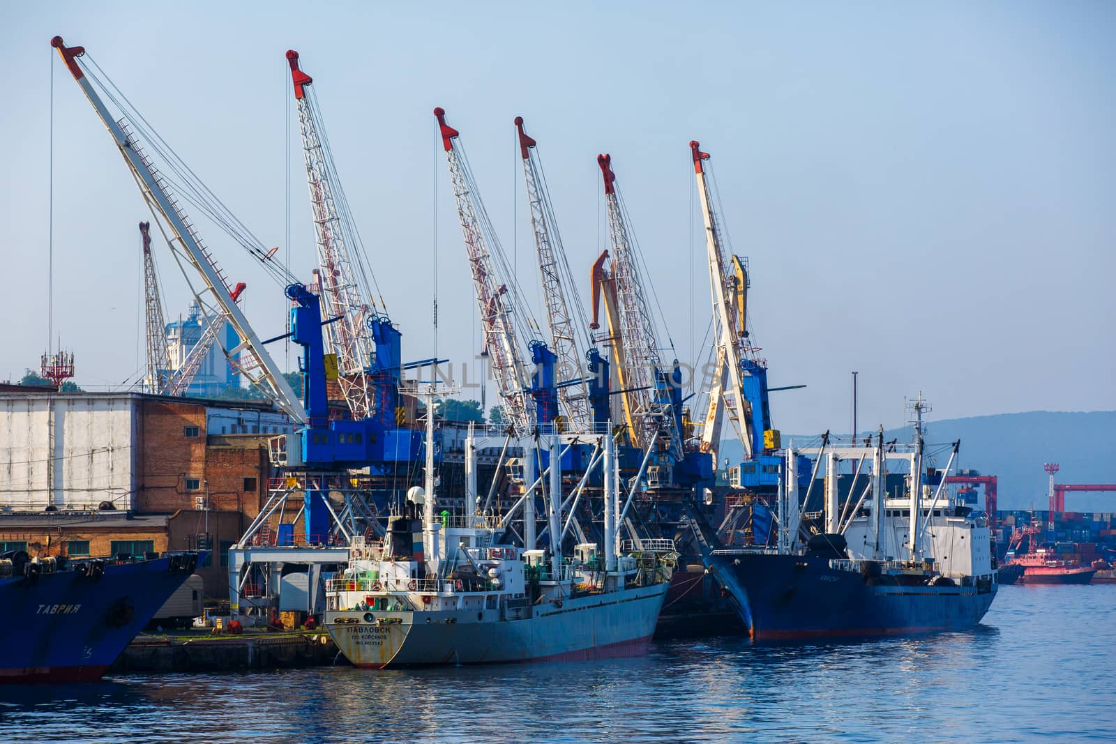 Summer, 2016 - Vladivostok, Russia - Vladivostok Sea Port. Commercial coasters are loading at the commercial port of Vladivostok.