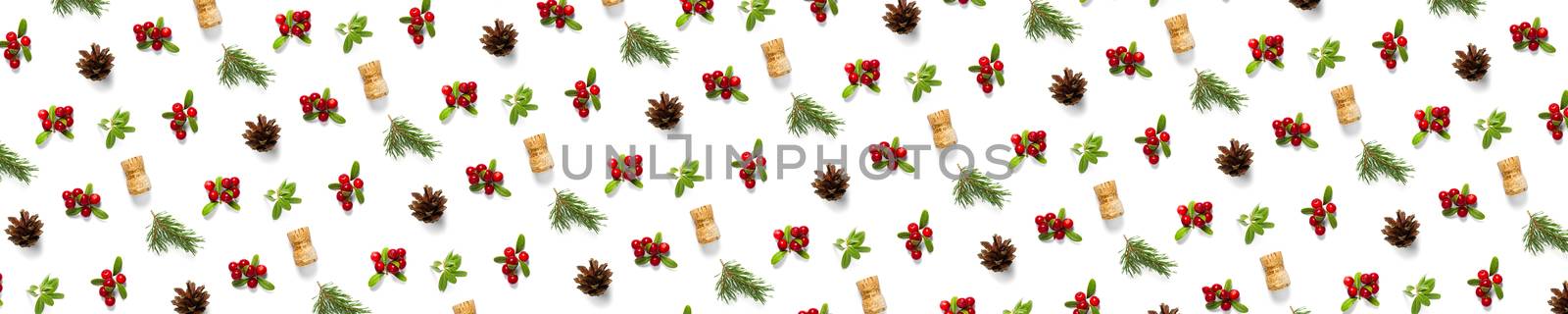 christmas background with pine cone, wine cork, pine twig and lingonberry. christmas background on white backdrop