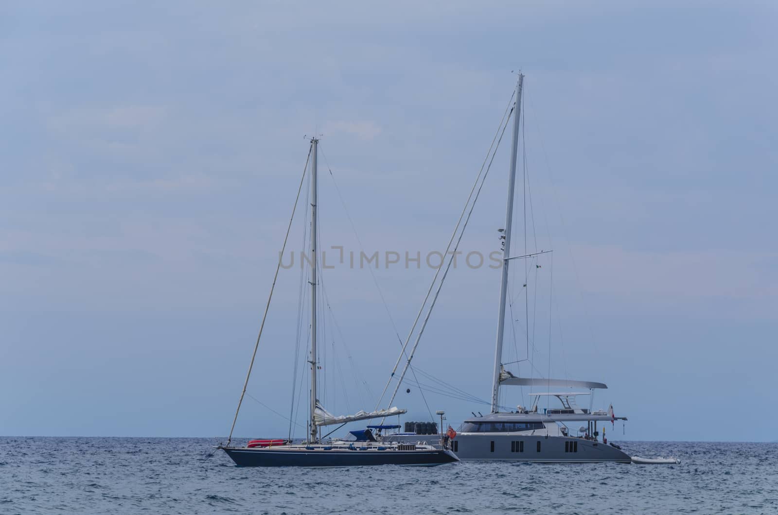 On the Tyrrhenian sea off the coast of Lipari island sail two modern sailing boats