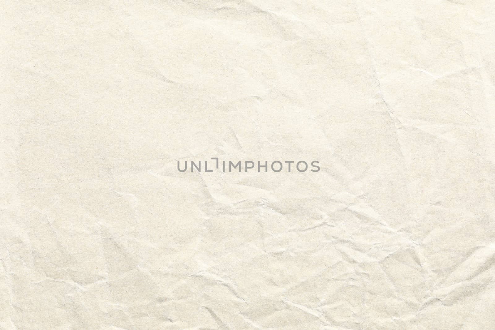 Crumpled old pale brown paper background texture