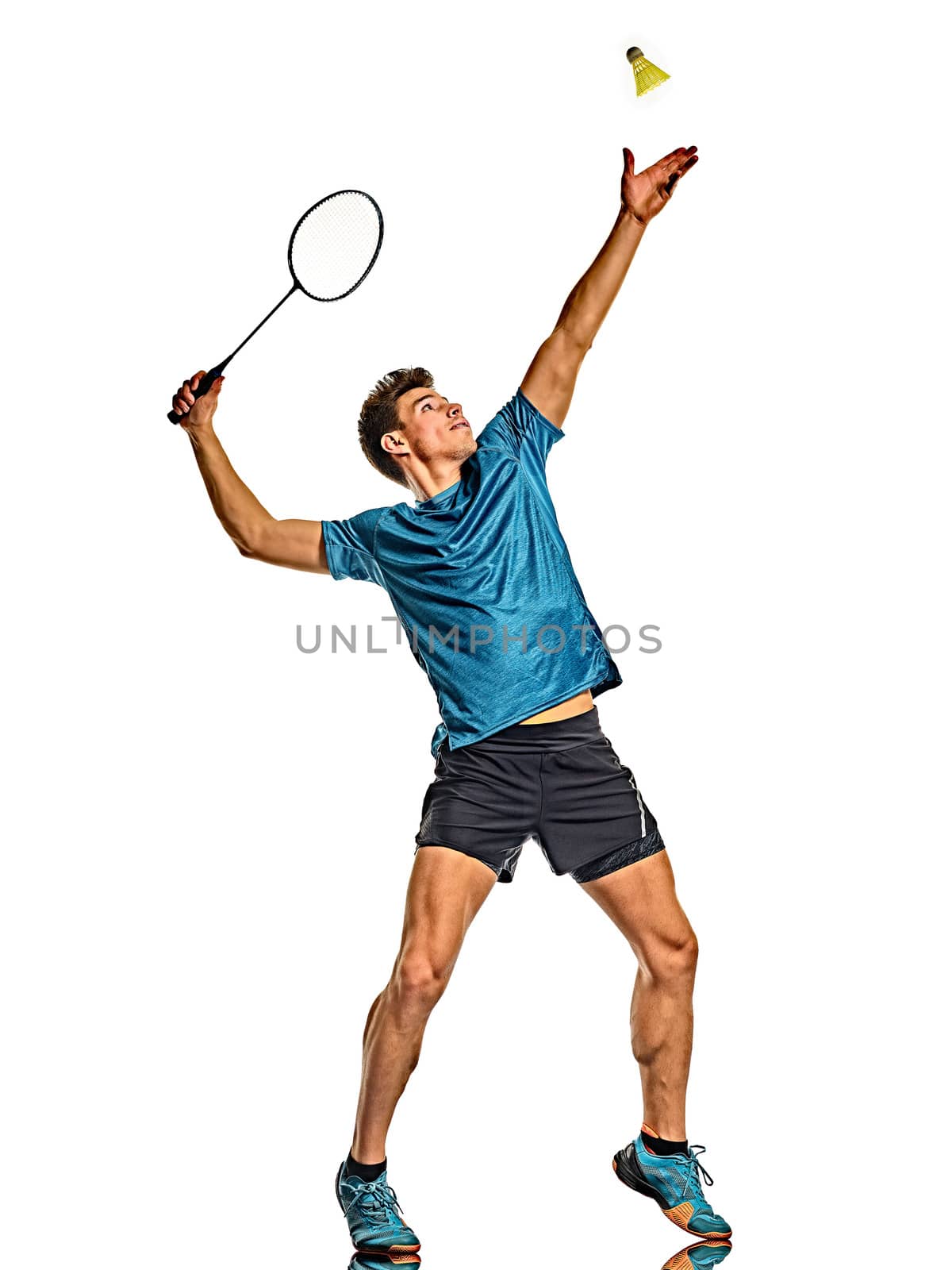 one caucasian youg Badminton player man in studio isolated on white background