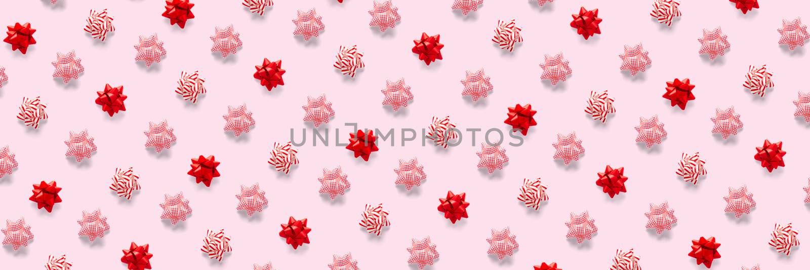 modern christmas background on pink backdrop. creative flat lay for christmas time, banners, posters, prints and other creative works. by PhotoTime