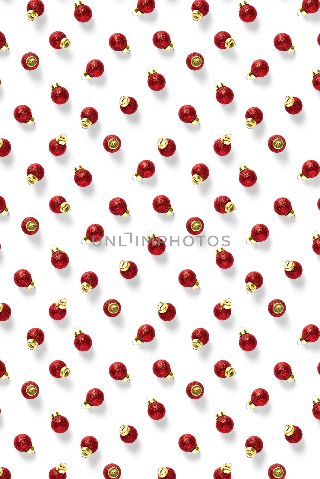 Christmas red decorations on white background. Christmas ornaments composition for background. Flat lay background madefrome red ornaments decorations