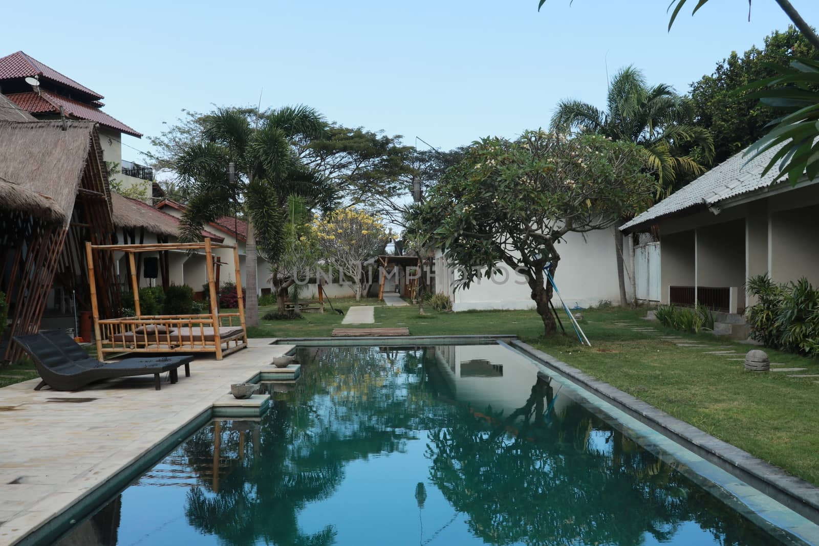 Luxury swimming pool in the tropical hotel.