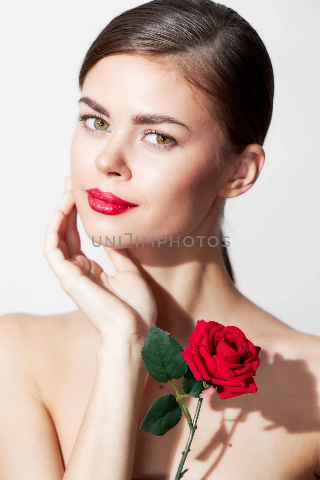 Girl with bare Rose charm gift shoulders body care isolated background