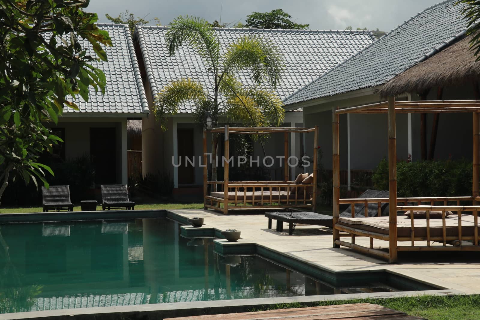 Luxury swimming pool in the tropical hotel.