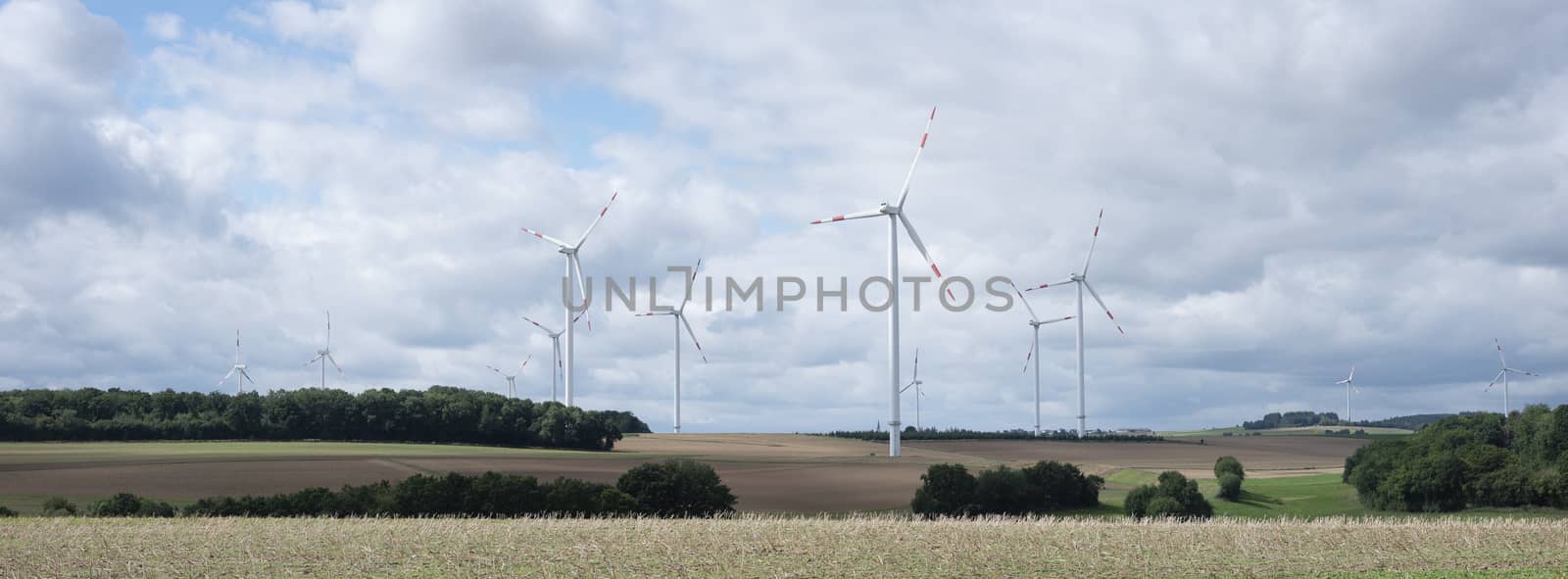 fields and wiind turbines in german eifel by ahavelaar