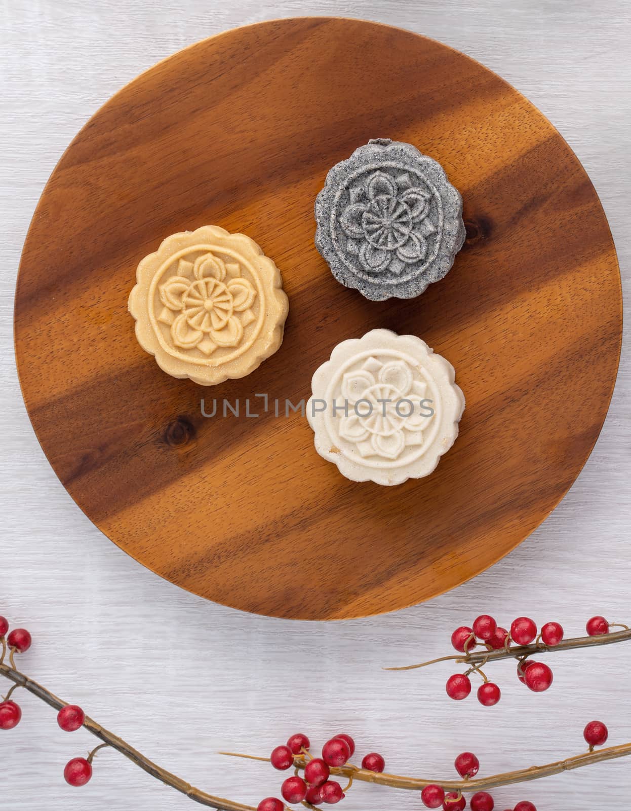 Colorful beautiful moon cake, mung bean cake, Champion Scholar Pastry cake for Mid-Autumn festival traditional gourmet dessert snack, top view, flat lay.