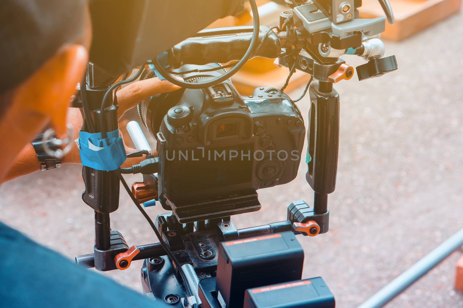 Film industry. Filming with professional camera background