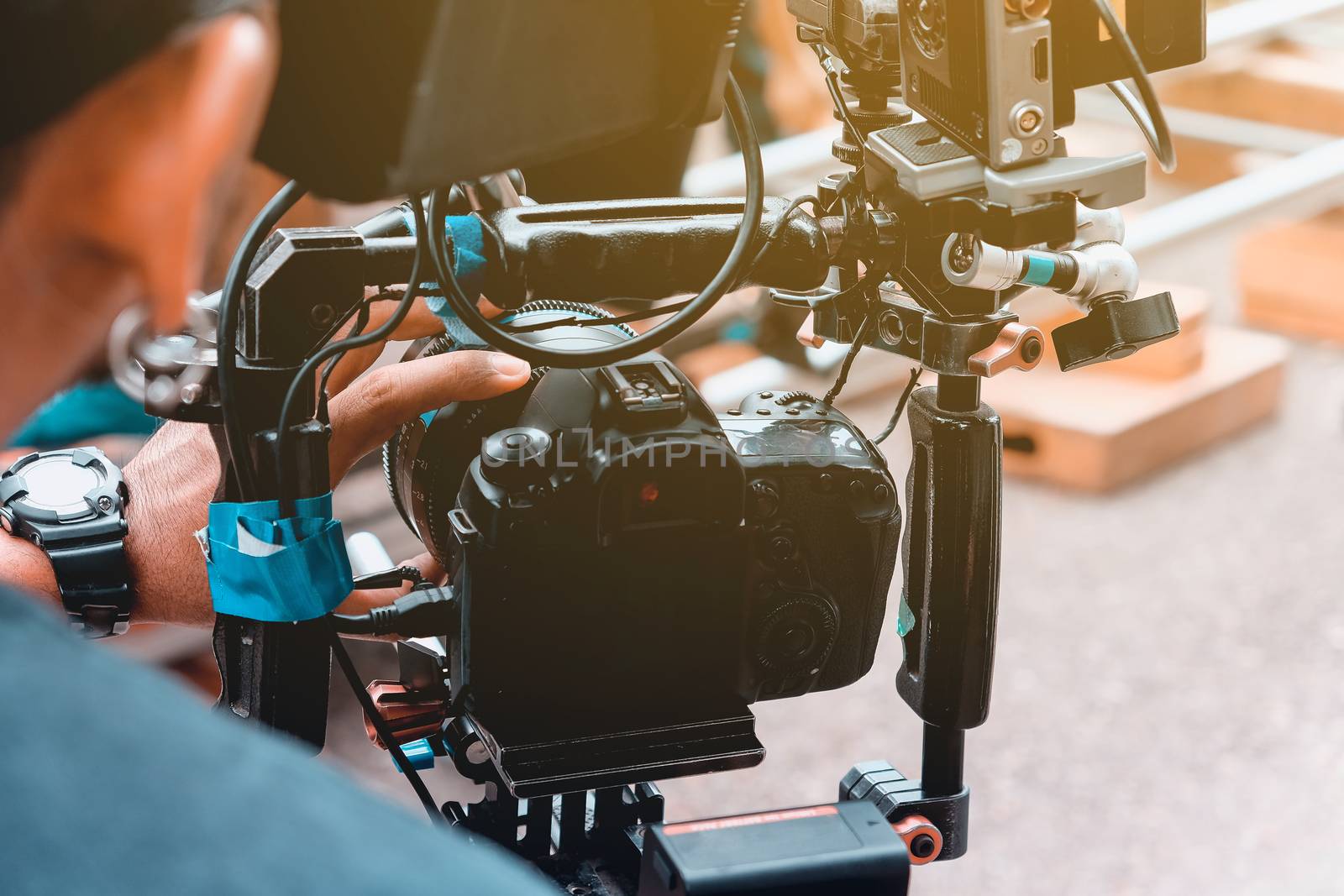 Film industry. Filming with professional camera background