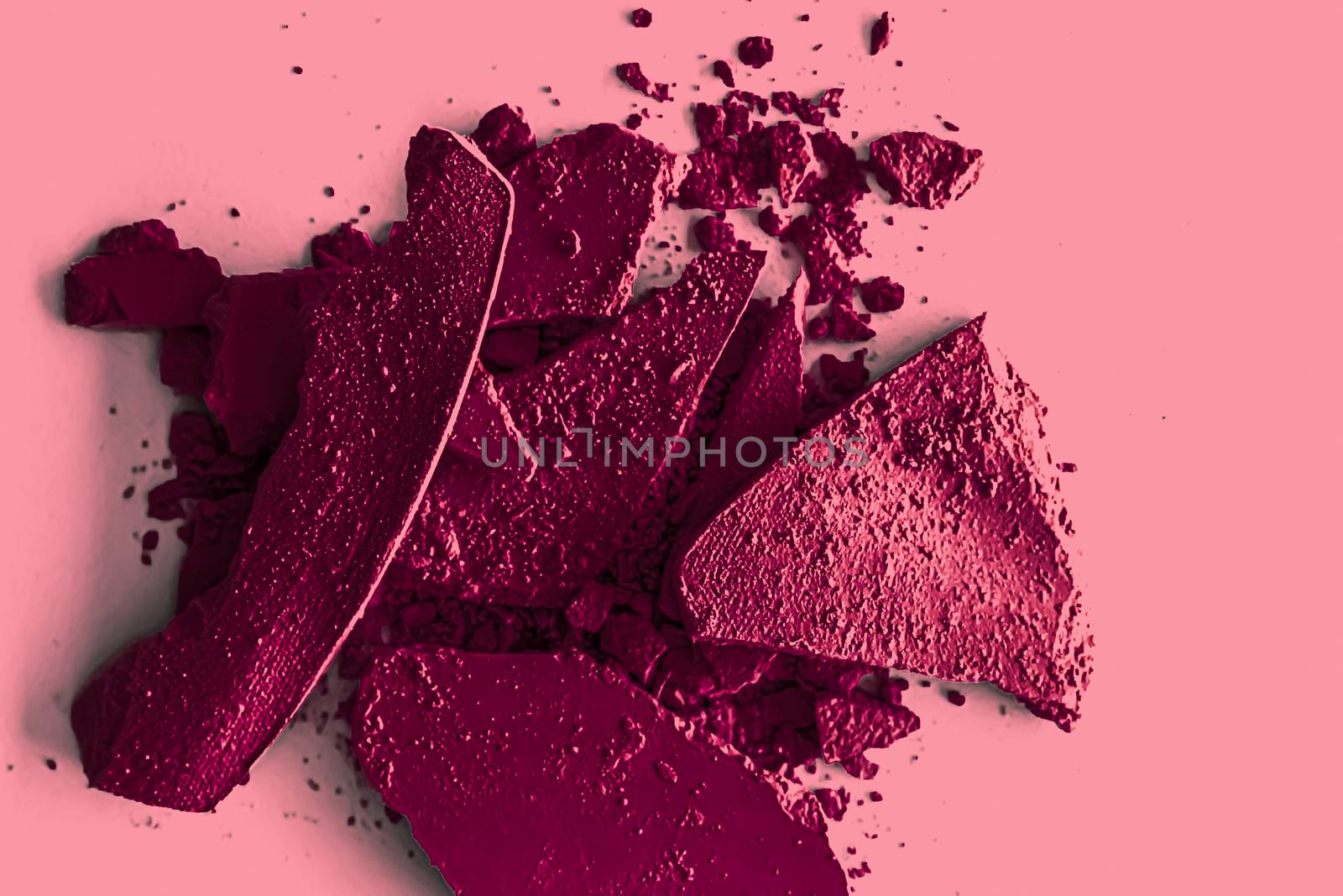 Burgundy eye shadow powder as makeup palette closeup, crushed cosmetics and beauty texture by Anneleven