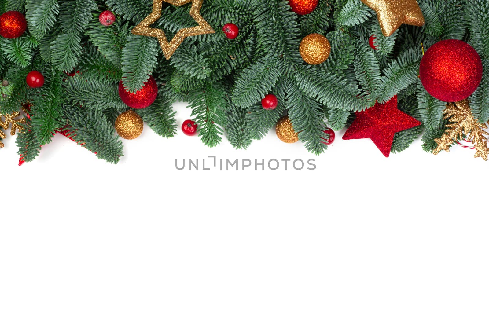 Christmas design boder frame greeting card of noble fir tree branches and red and golden baubles isolated on white background