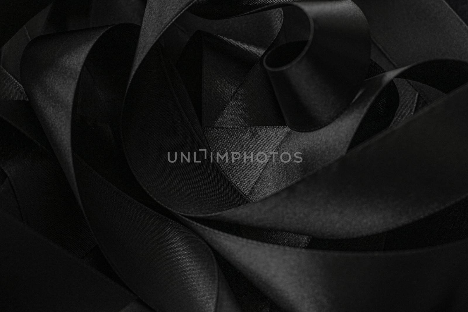 Black silk ribbon as background, abstract and luxury brand design by Anneleven