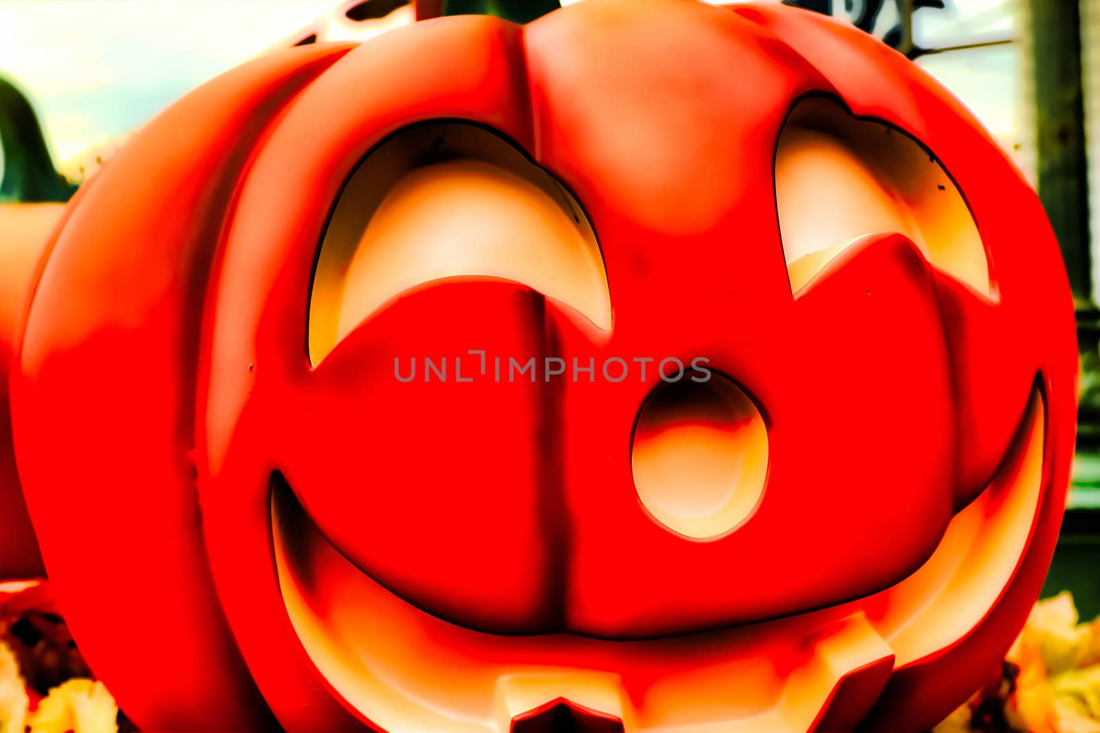 Halloween decorations concept.Close up of Jack O'lantern, vintage lanterns, pumpkins, skull, autumn leaves. Colorful Halloween. Happy Halloween scene background by USA-TARO