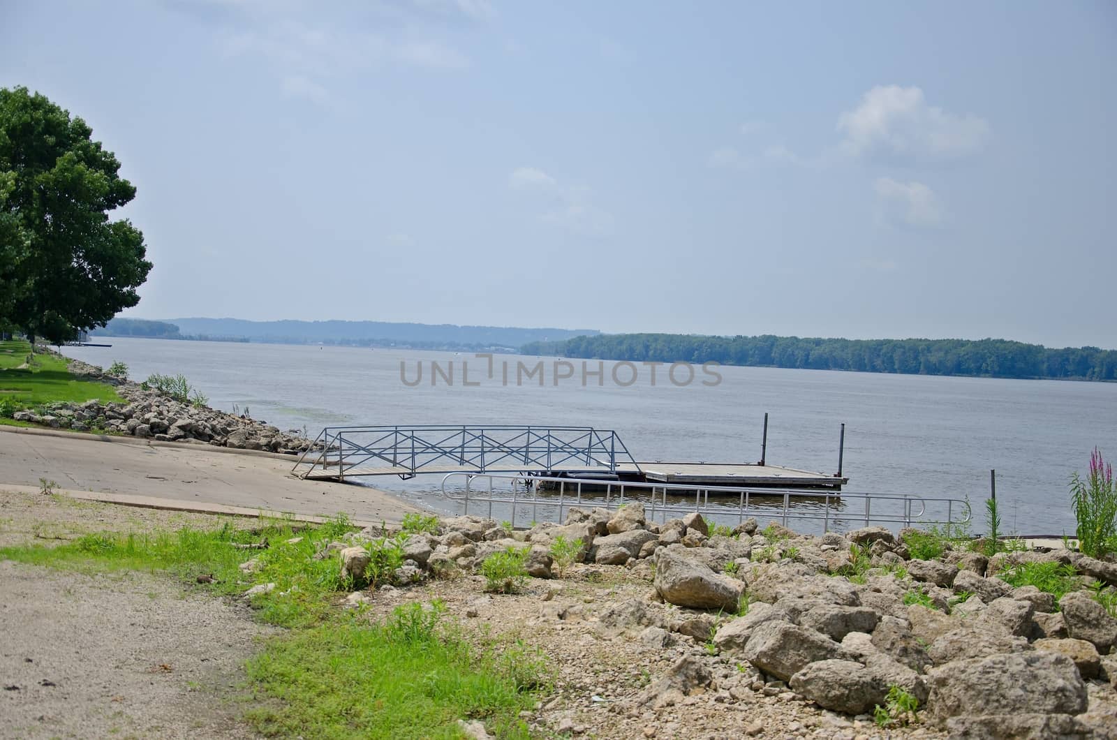 It is a boat dock offering the peace and quite olong a river.