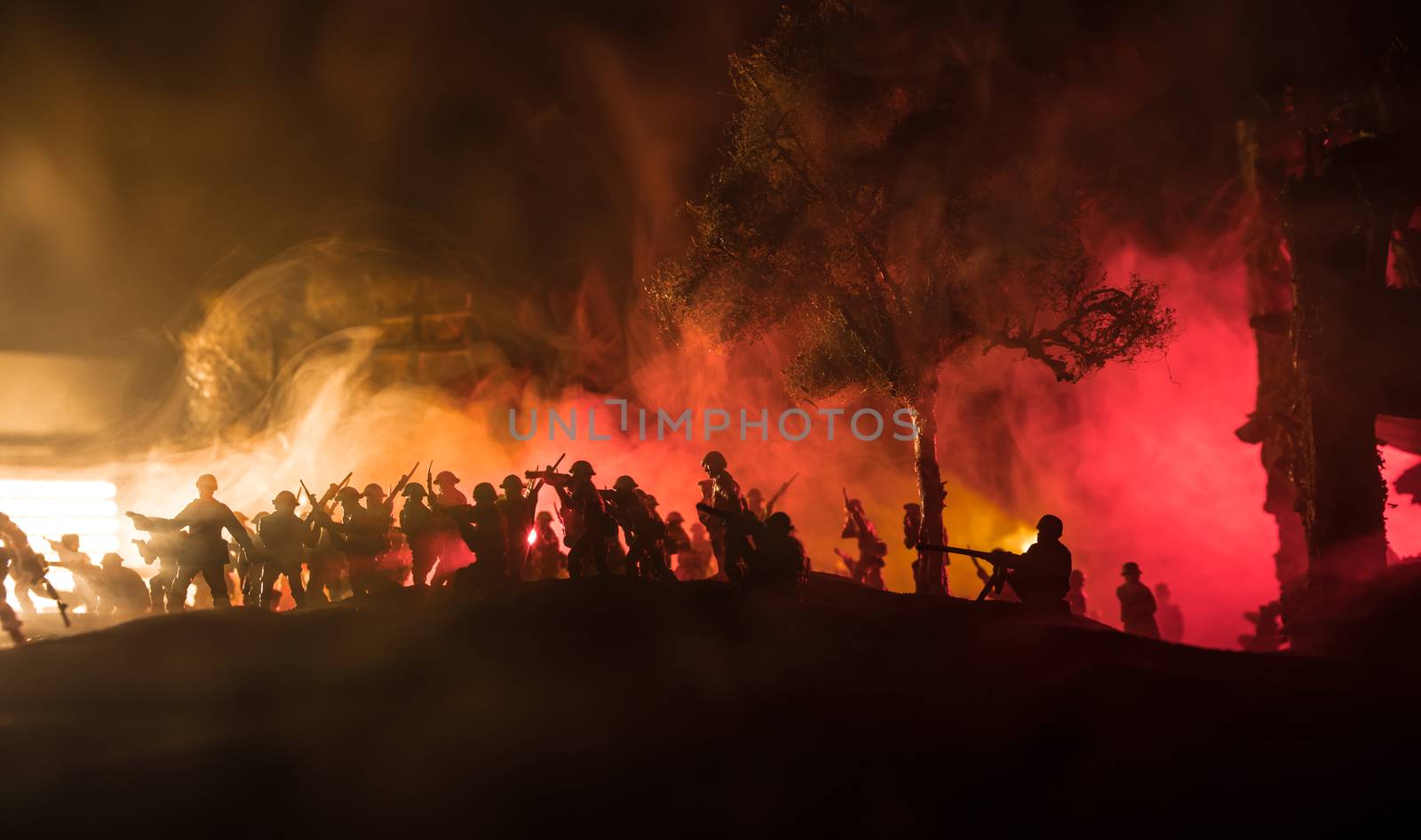 War Concept. Military silhouettes fighting scene on war fog sky background, World War Soldiers Silhouette Below Cloudy Skyline At night. Battle in ruined city. Selective focus