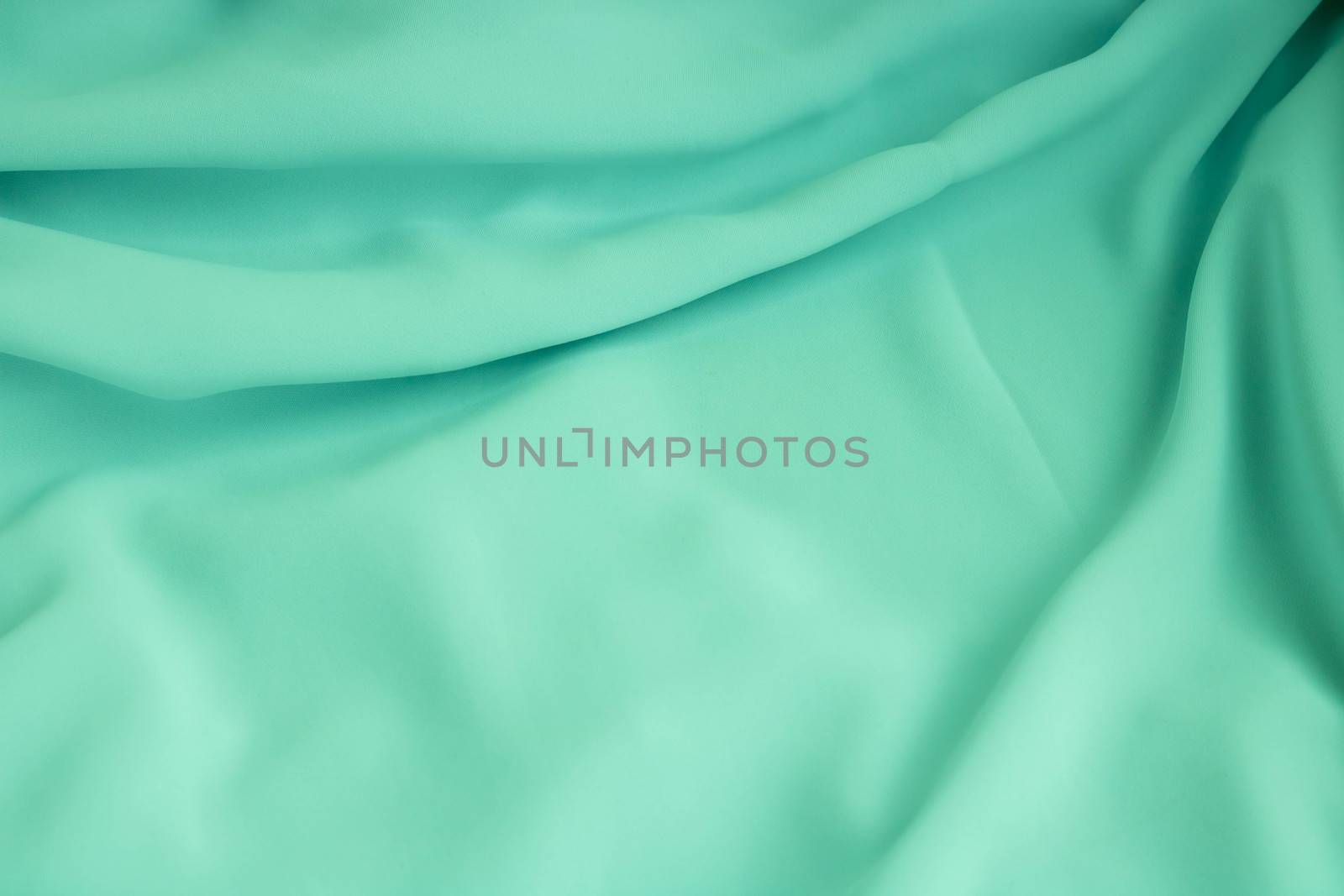 Turquoise fabric texture background, crumpled fabric background by lapushka62