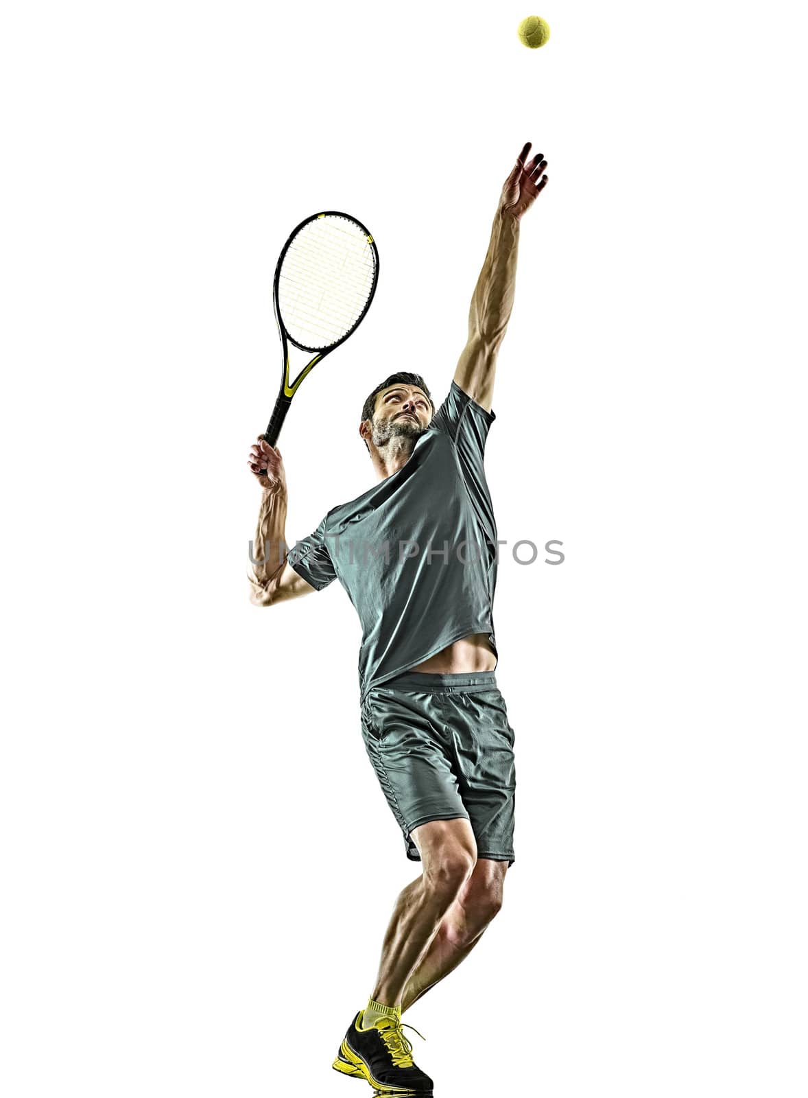 one caucasian mature tennis player man serving service in studio isolated on white background