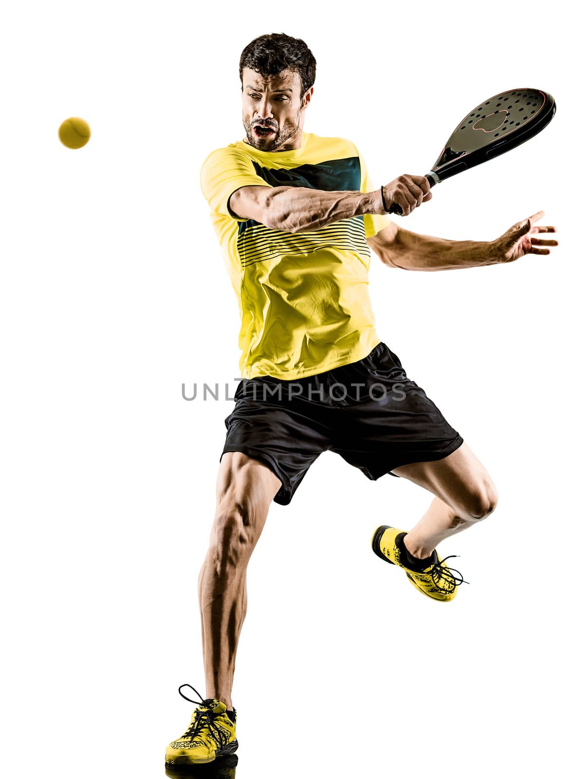 one caucasian man playing PadDLe tennis player isolated on white background