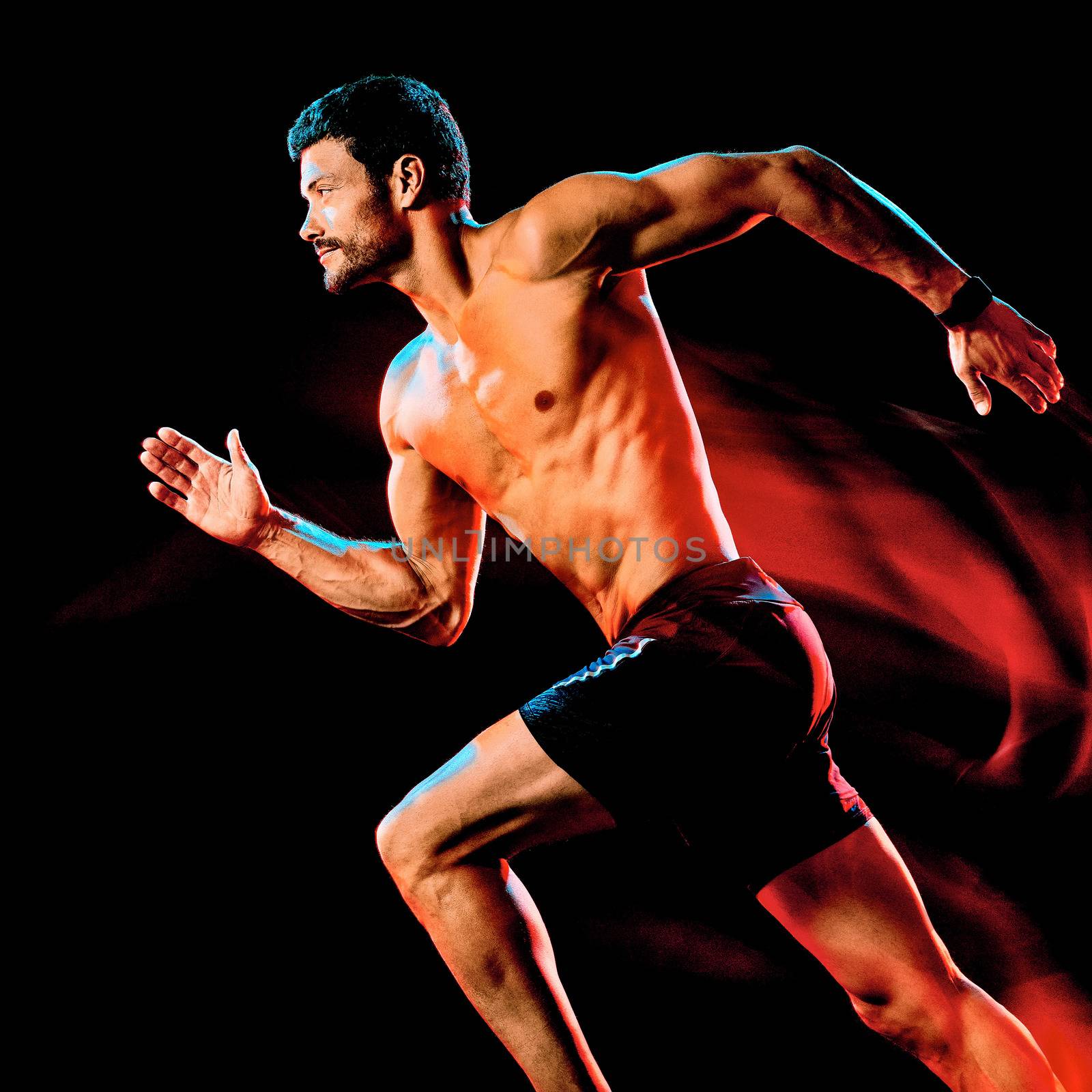 topless muscular man runner. running jogger jogging isolated black background by PIXSTILL