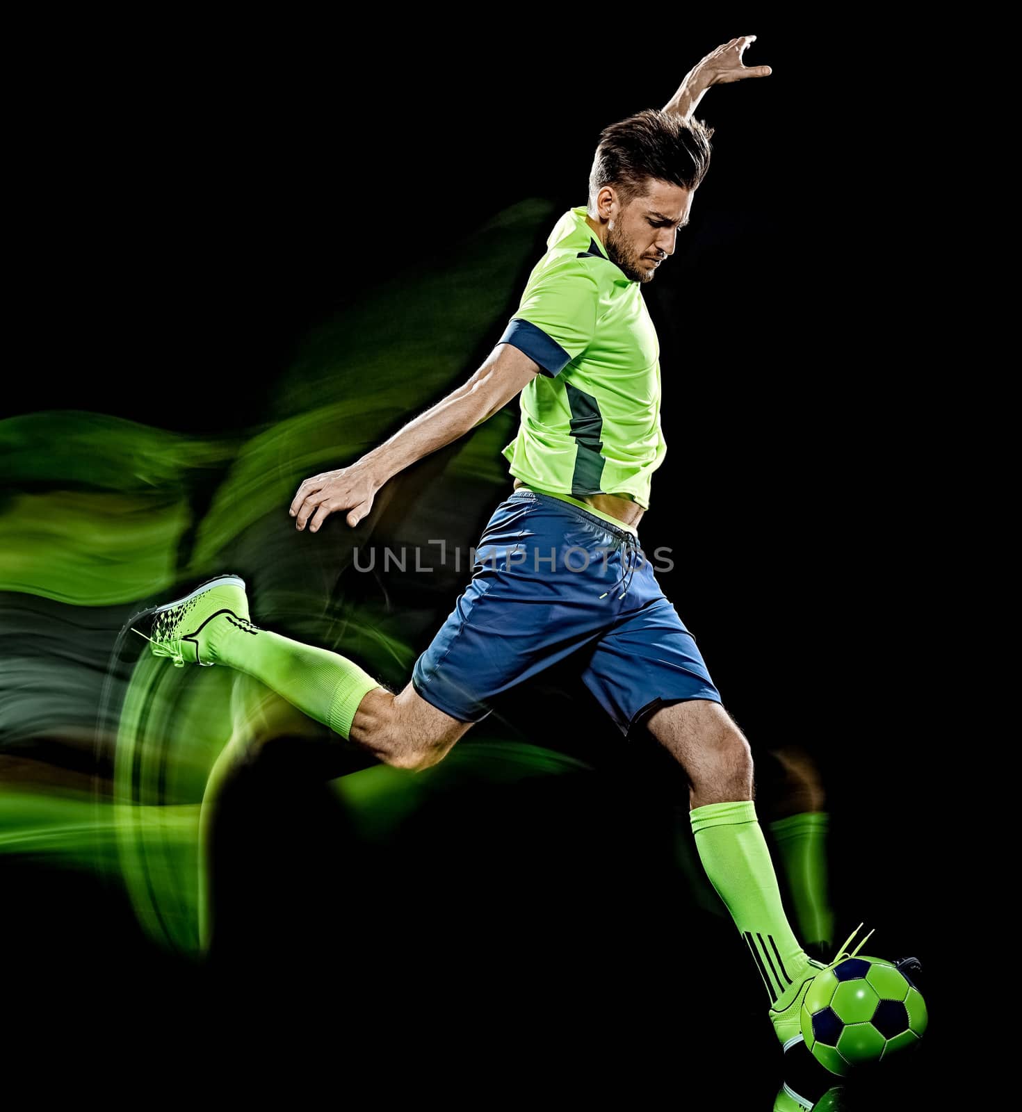 caucasian soccer player man isolated black background light painting by PIXSTILL
