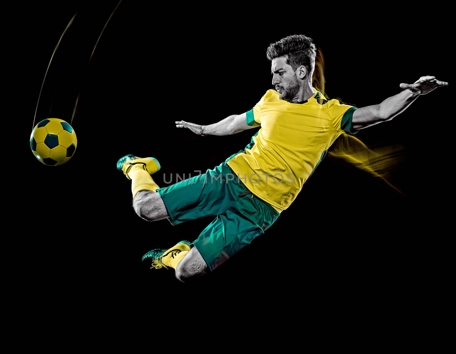 caucasian soccer player man isolated black background light painting by PIXSTILL