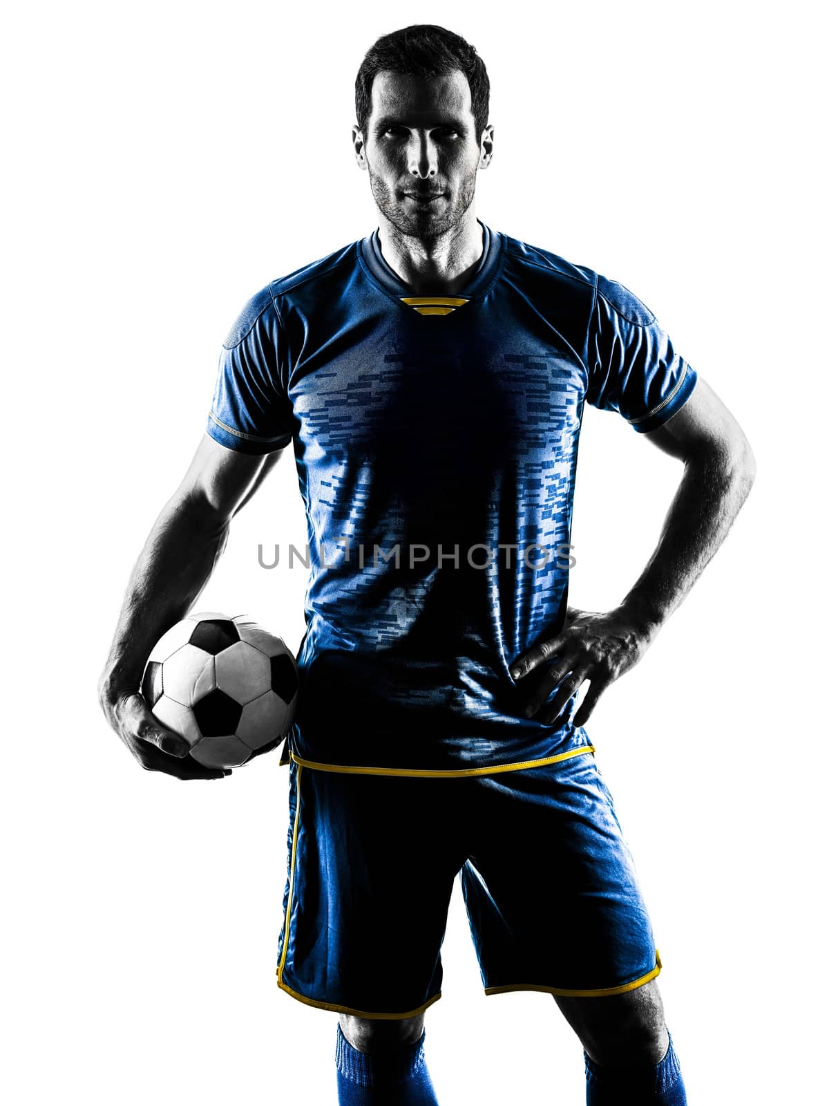 one caucasian soccer player man standing in silhouette isolated on white background
