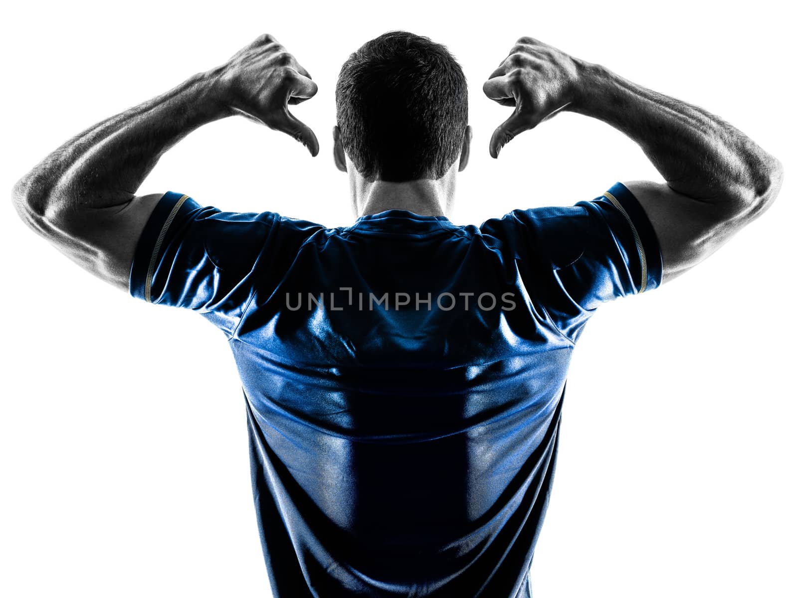 one caucasian soccer player man standing Rear View pointing in silhouette isolated on white background