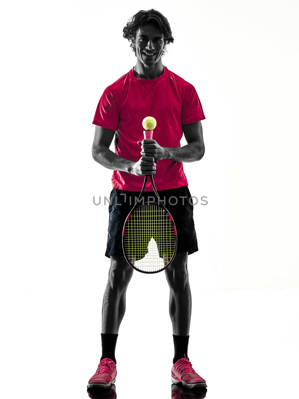 one caucasian hispanic tennis player man in studio silhouette isolated on white background