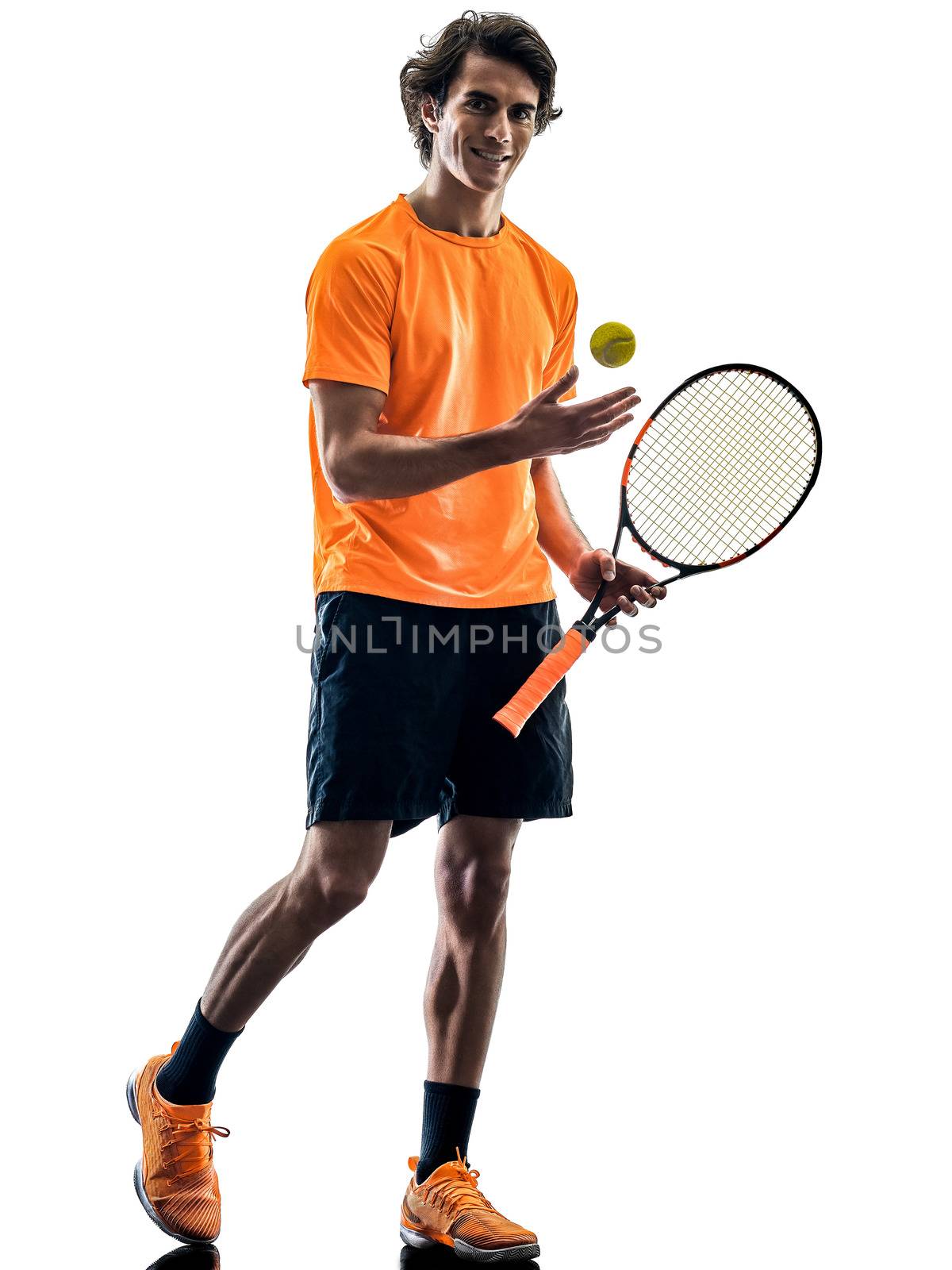 one caucasian hispanic tennis player man in studio silhouette isolated on white background