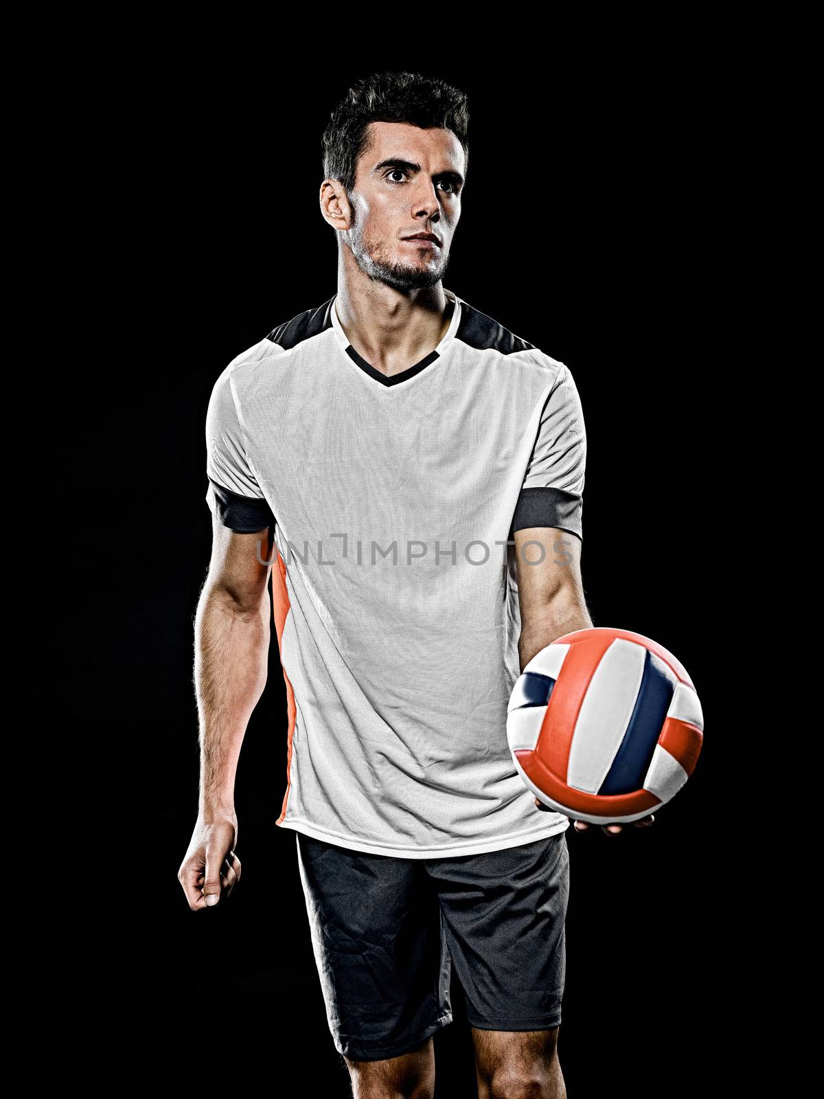 caucasian young volley ball player manisolated black background by PIXSTILL