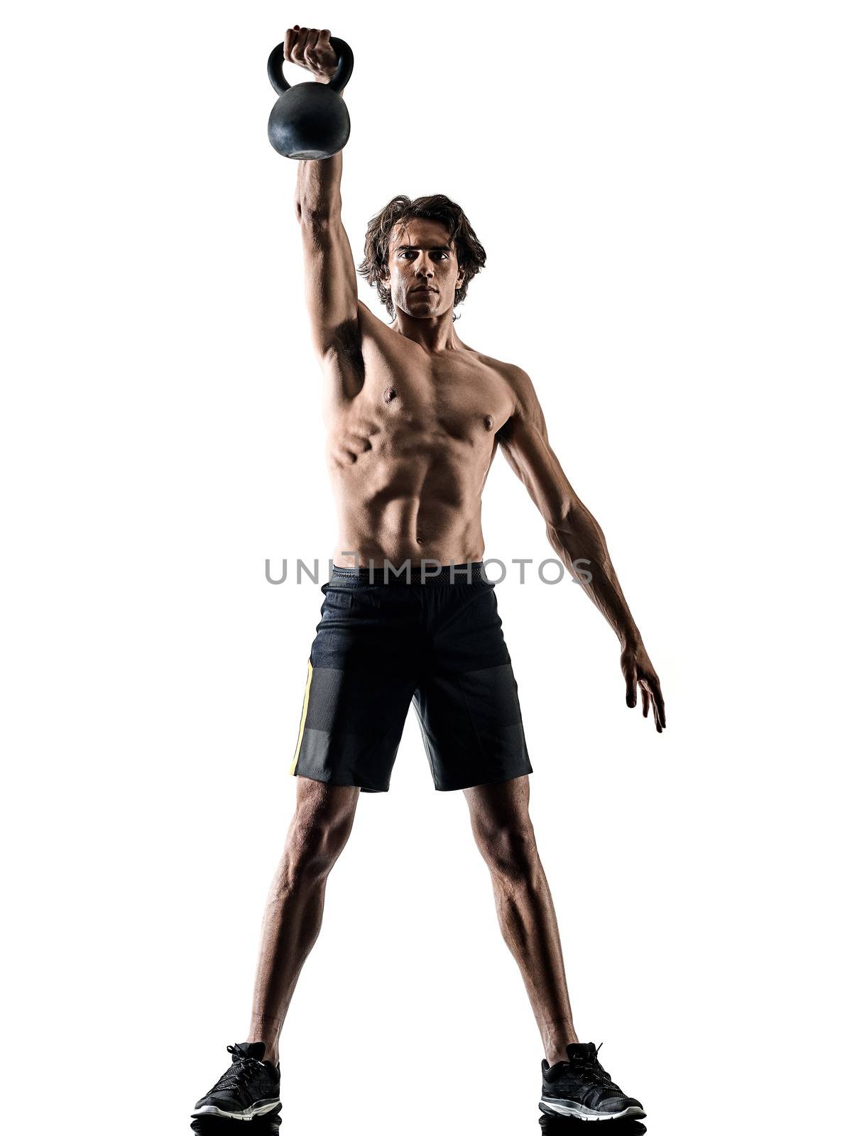 one caucasian man fitness weitghs training exercises  studio in silhouette isolated on white background