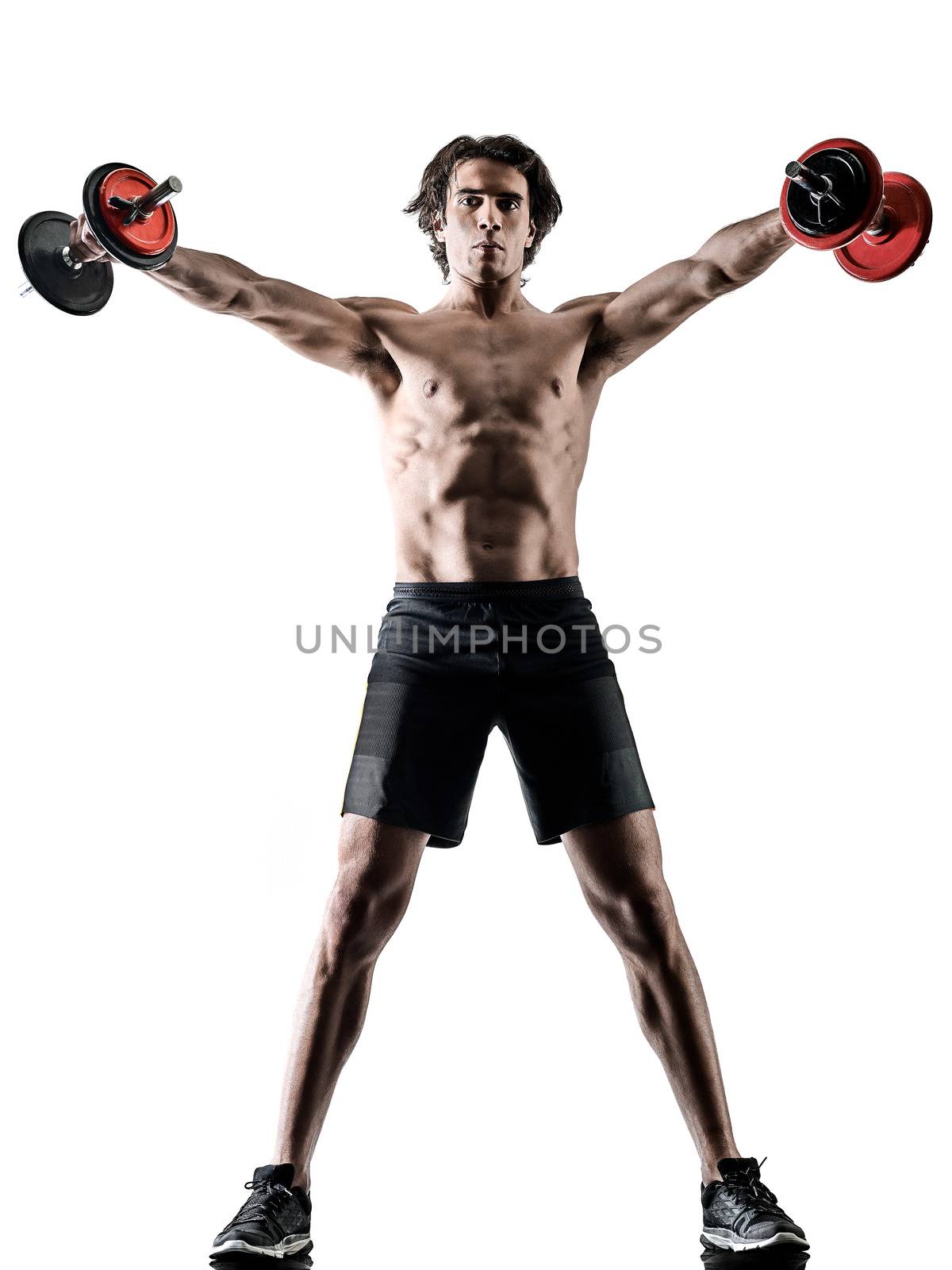 one caucasian man fitness weitghs training exercises studio in silhouette isolated on white background
