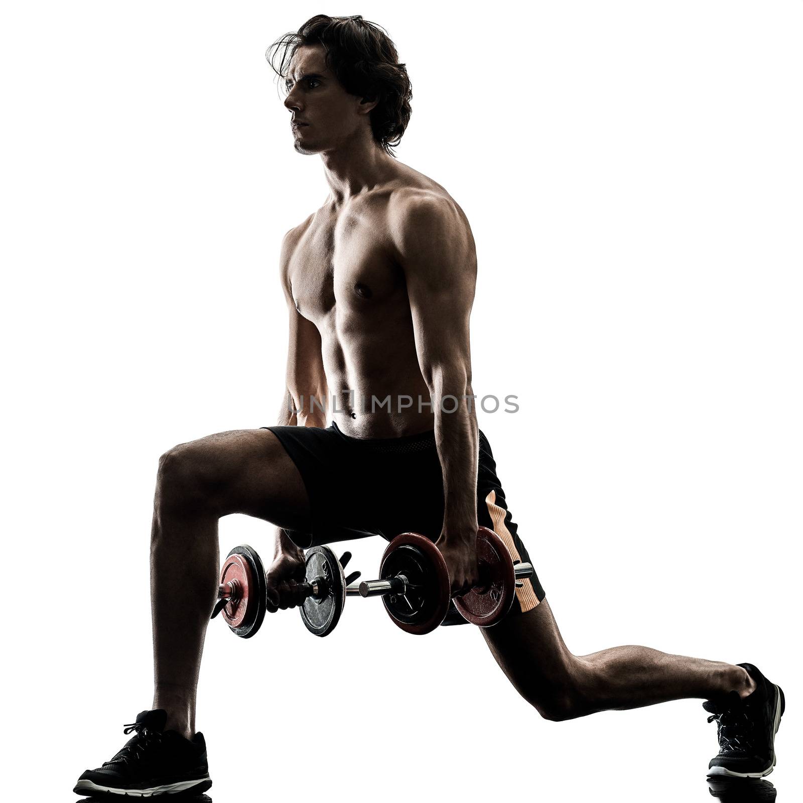 one caucasian man fitness weitghs training exercises  studio in silhouette isolated on white background